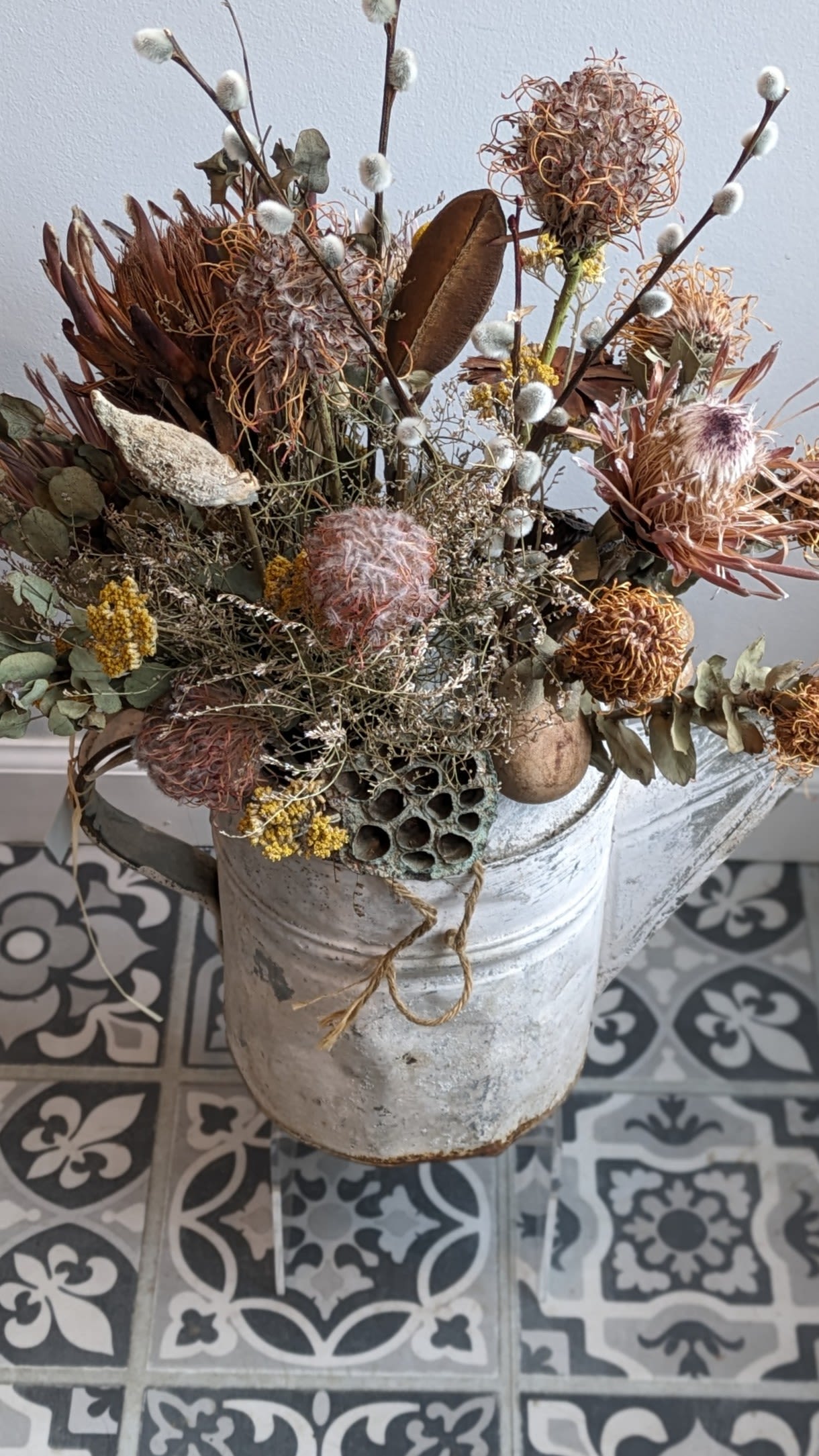 Tin Watering Can Dried Arrangement Tin Watering Can Dried Arrangement - Tin Watering Can Dried Arrangement All Flowers in this arrangement have been dried