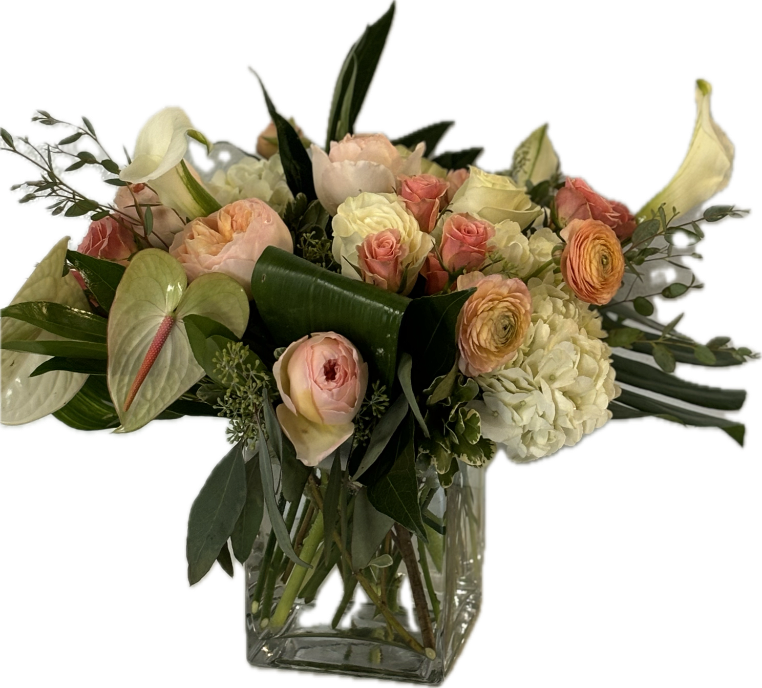 Summer Blush Summer Blush - Elegant and stunning arrangement of hydrangea, calla lilies, anthurium, sweetheart and garden roses, ranunculus and variety of exotic greens.