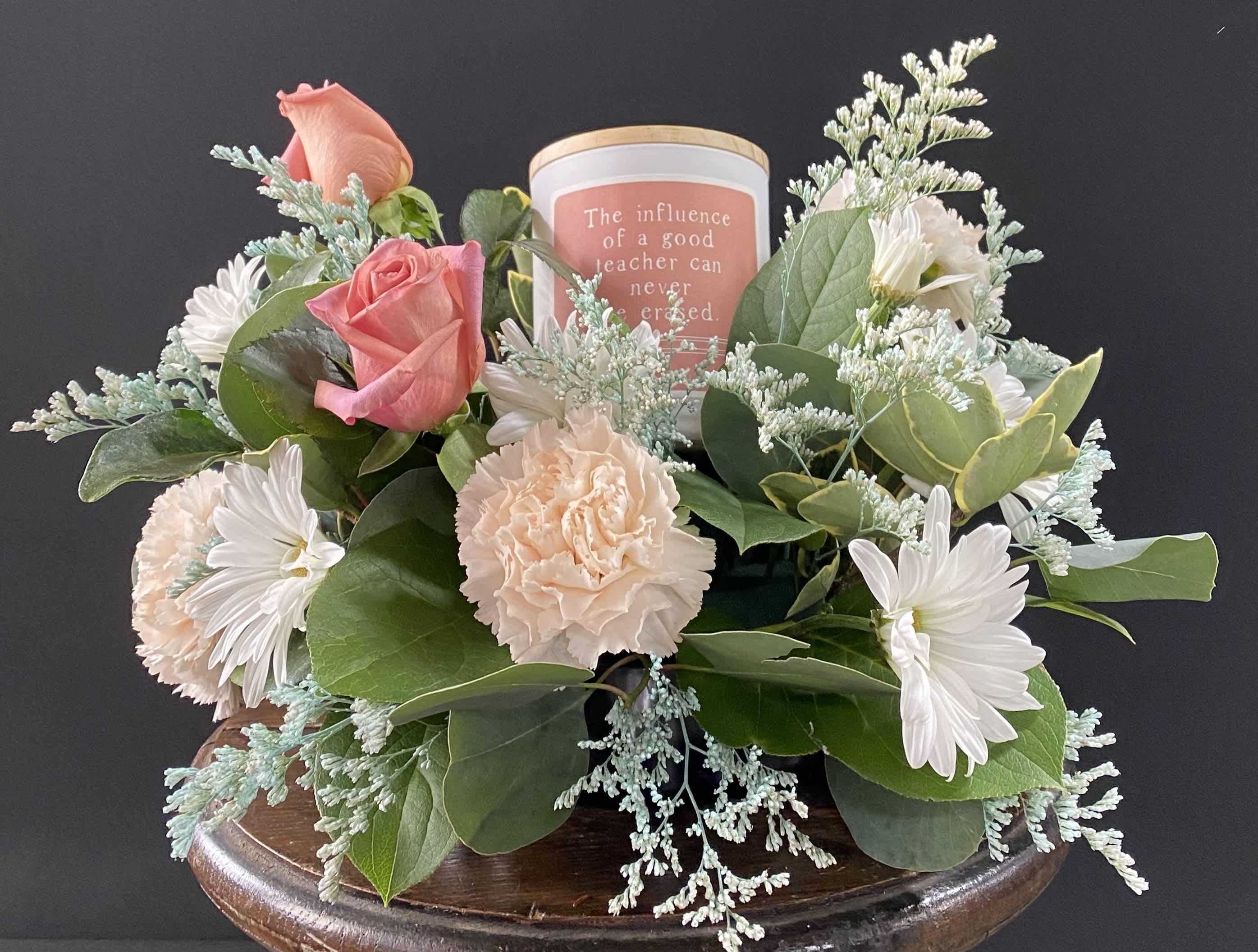 Teacher Candle &amp; Flowers - Need a gift for a teacher?  This floral arrangement is a very nice and unique gift for the teacher.  The candle reads &quot;The influence of a good teacher can never be erased.&quot; The scent is Vanilla Delight. Flowers can always be customized, just let us know in &quot;Special Instructions&quot; or give us a call.