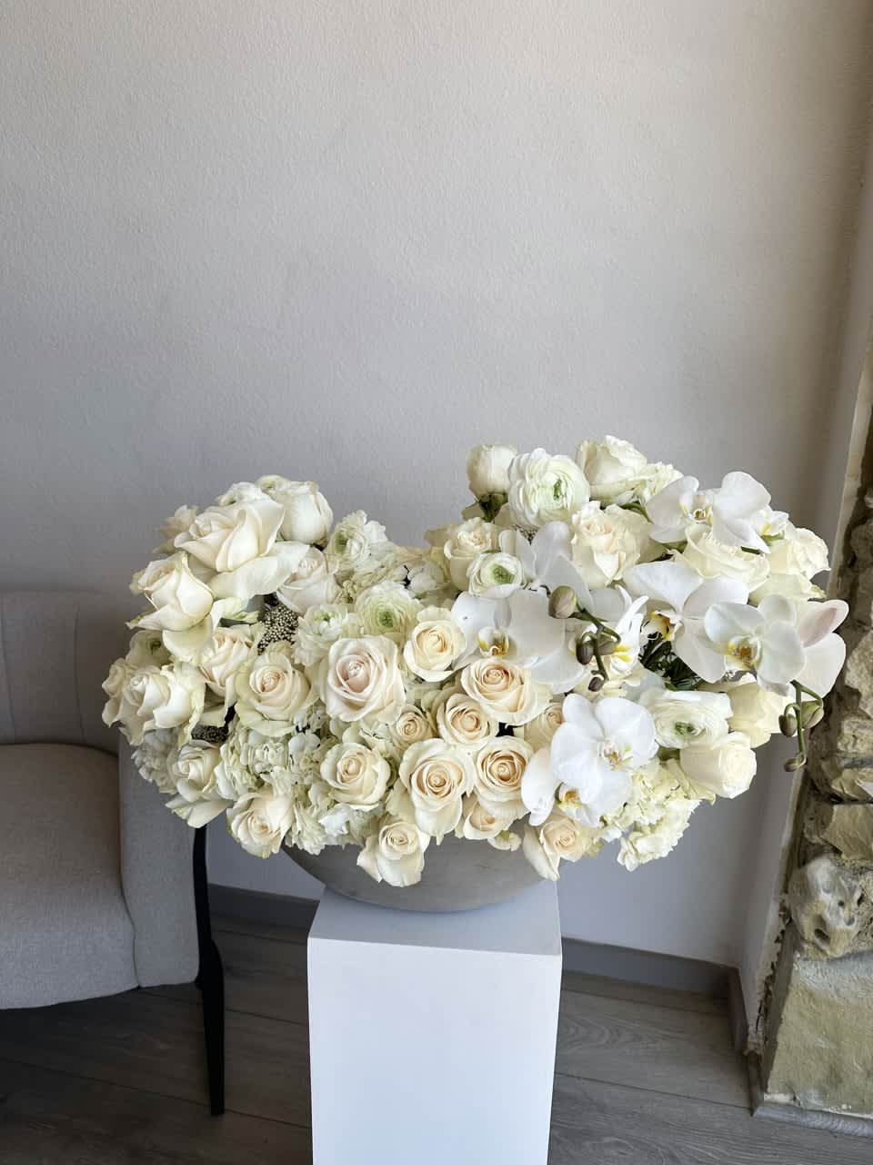 Classic White Flower Elegance - Immerse yourself in the tranquility of our White Petal Bliss Bouquet. This ethereal arrangement features a delicate interplay of pure white flowers, creating a serene and timeless ambiance. The blossoms, like whispers of tranquility, come together in perfect harmony, offering a moment of peace and elegance. Whether gracing a special occasion or bringing serenity to your space, this bouquet is a captivating celebration of the beauty found in simplicity.