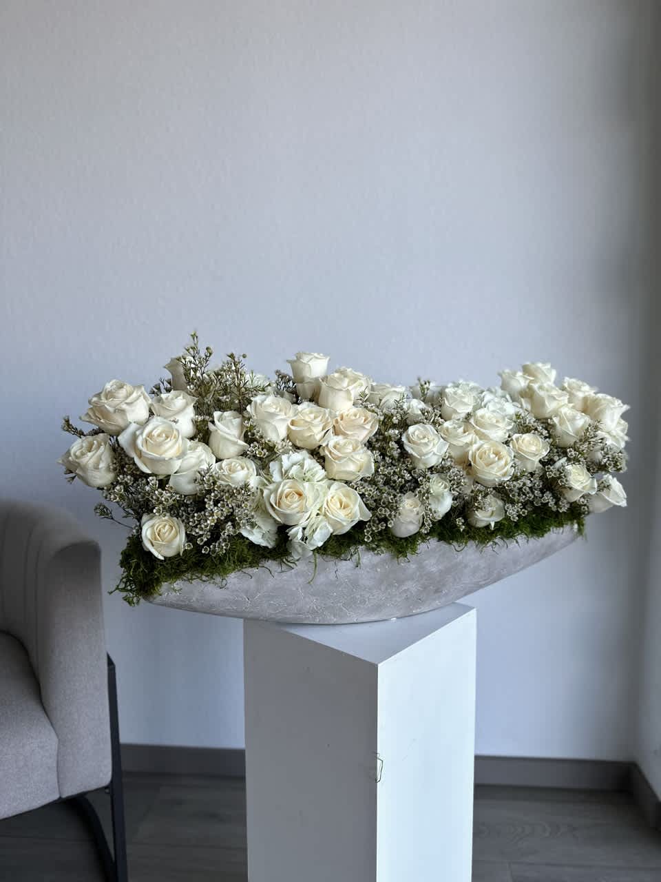 Modern Concrete Blossom Affair - A chic rendezvous of nature and urban style, our Modern Concrete Blossom Affair boasts a curated mix of blooms in a sleek concrete vase. This contemporary arrangement merges soft elegance with industrial aesthetics, creating a visual delight that stands as a unique expression of modern sophistication.
