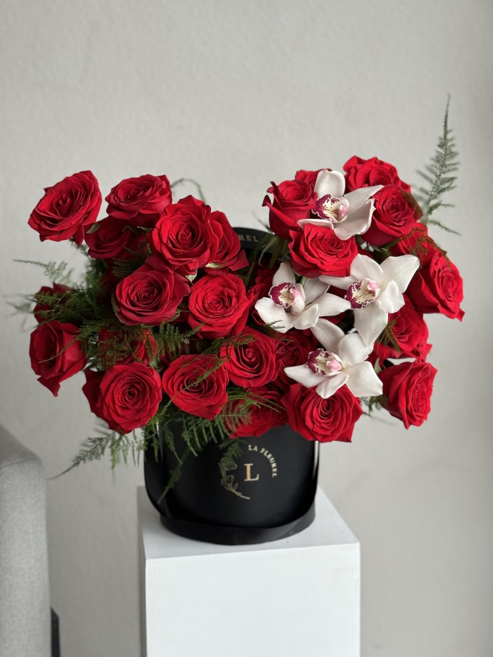Romance in a Box - Capture the spirit of Valentine's Day with our 'Romance in a Box' arrangement. This enchanting display of delicate blooms, nestled in an elegant box, is a perfect expression of love. Share the romance with this stylish and heartfelt gift.