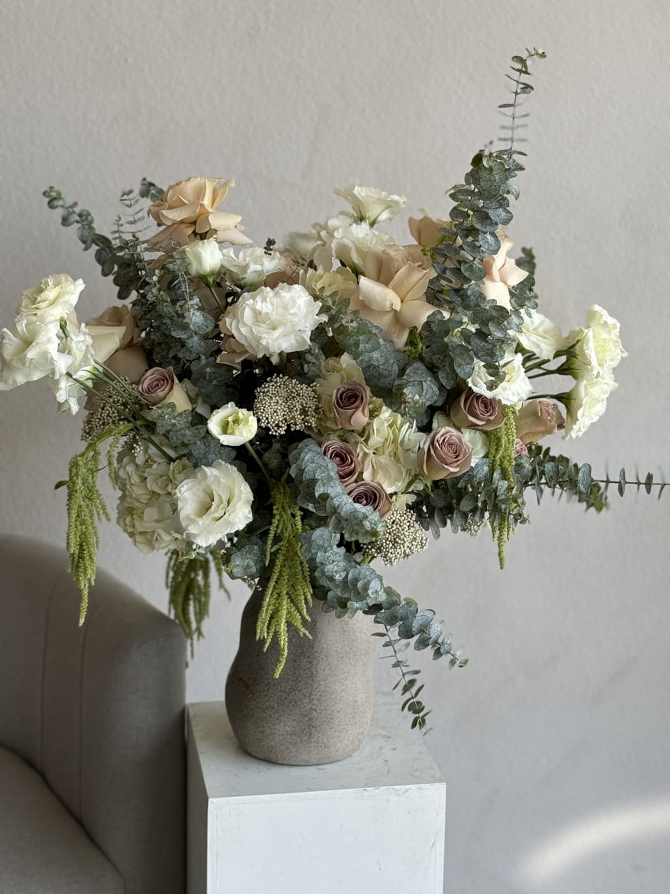 Woodland Wonders - Embrace the serene beauty of nature with our Woodland Wonders arrangement. Featuring exquisite Quicksand roses and enchanting Amnesia roses, this bouquet captures the earthy elegance of the woods. Perfect for adding a touch of rustic charm to any setting, it's a harmonious blend of natural tones and sophisticated blooms.