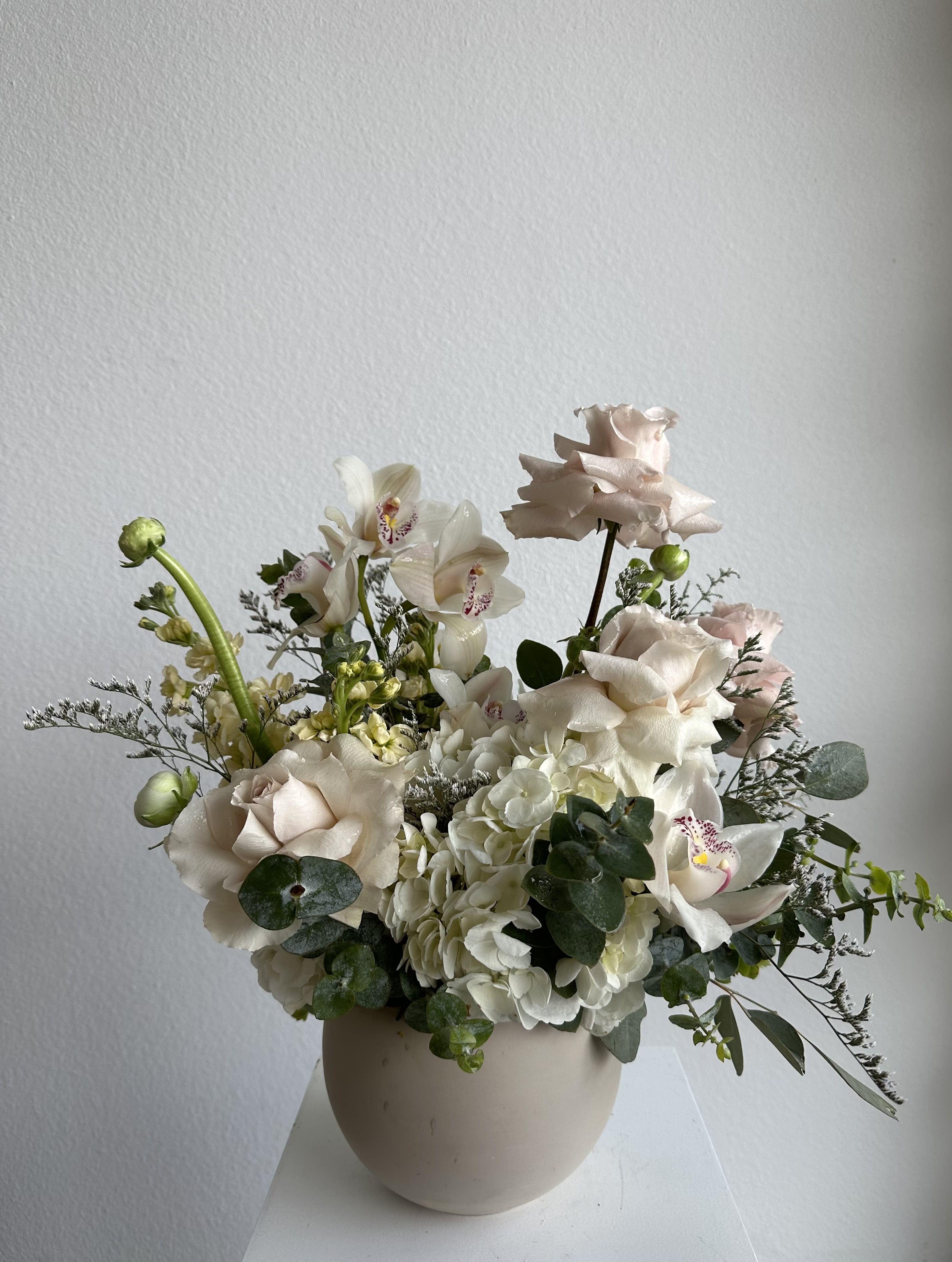 Harmony in Bloom -  This beautiful arrangement filled with the flowers to deliver your special message to your special someone.  Perfect for any occasion.  Arrangement includes: mix flowers  Ceramic Vase Custom greeting card