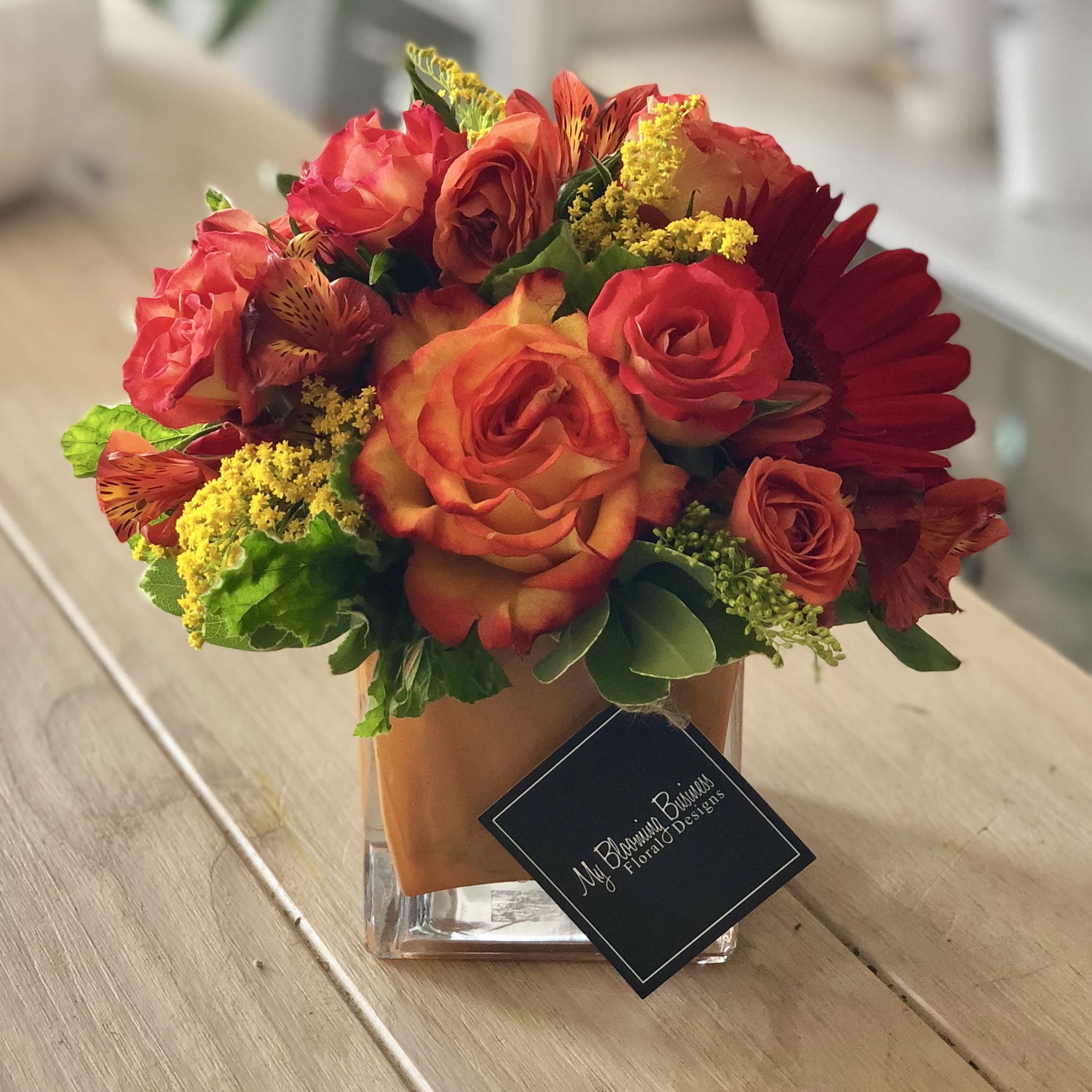 Sienna  - Nothing will show your special someone that you appreciate them quite like the Sienna — a clever and witty way to bring a pop of sunny positive energy into any room. It's a great gift for your loved ones, adding a touch of brightness and beauty to their home. Who can resist the beauty of these orange roses? We certainly can't!   Grab a Sienna today and bring a little sunshine to your loved ones!