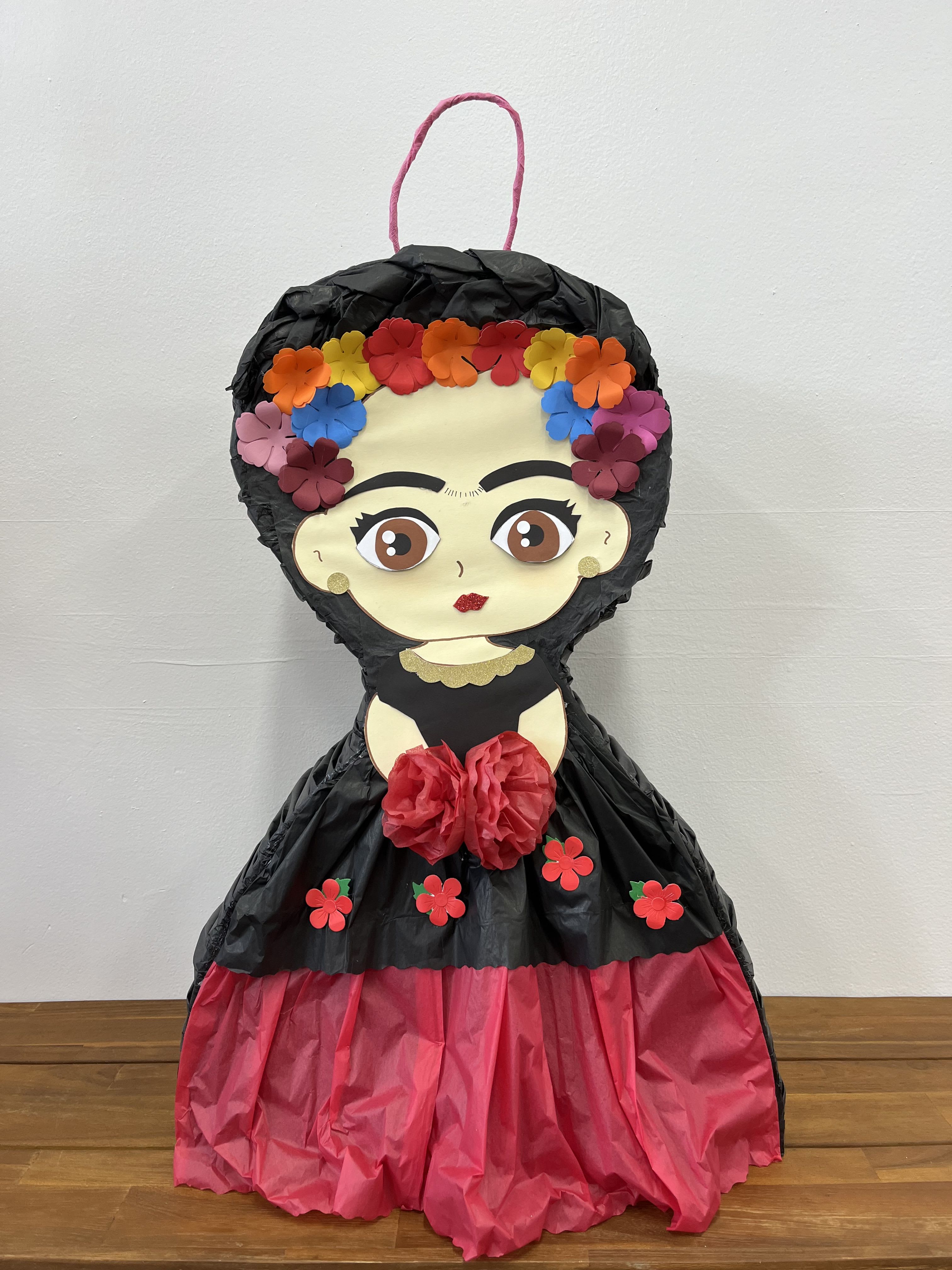 Sophia's Glamour Piñata - Celebrate in style with our Sophia's Glamour Piñata, inspired by the chic and confident Sophia Hadjipanteli. This piñata embodies sophistication and flair, featuring a bold and glamorous design that captures the essence of Sophia's unique style.