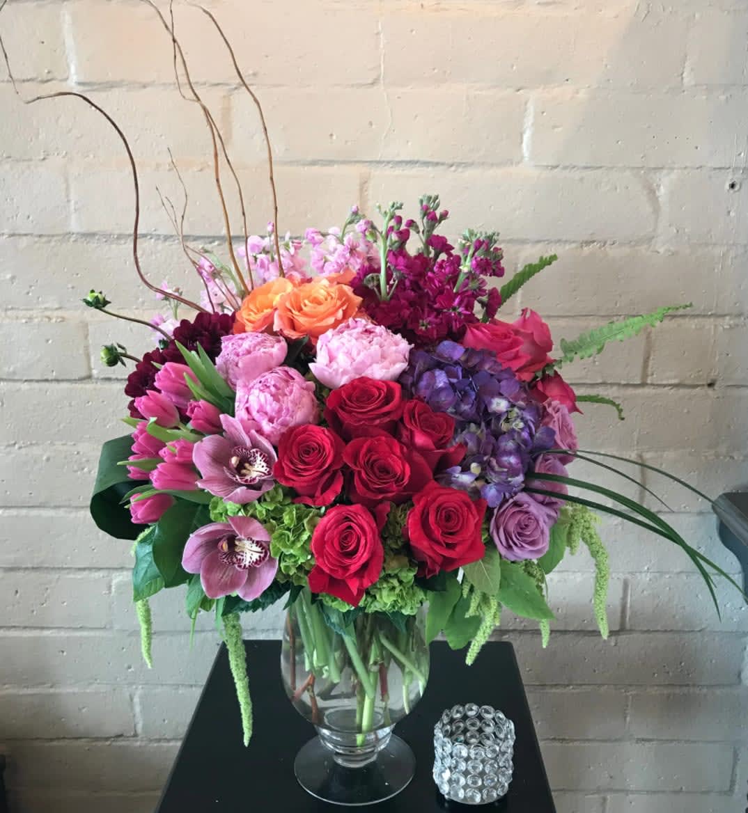 Bountiful Beauty - When you know they deserves the best! This show stopper arrangement is designed in a large premium pedestal vase and is bountifully filled with a selection of premium posies sure to wow them!