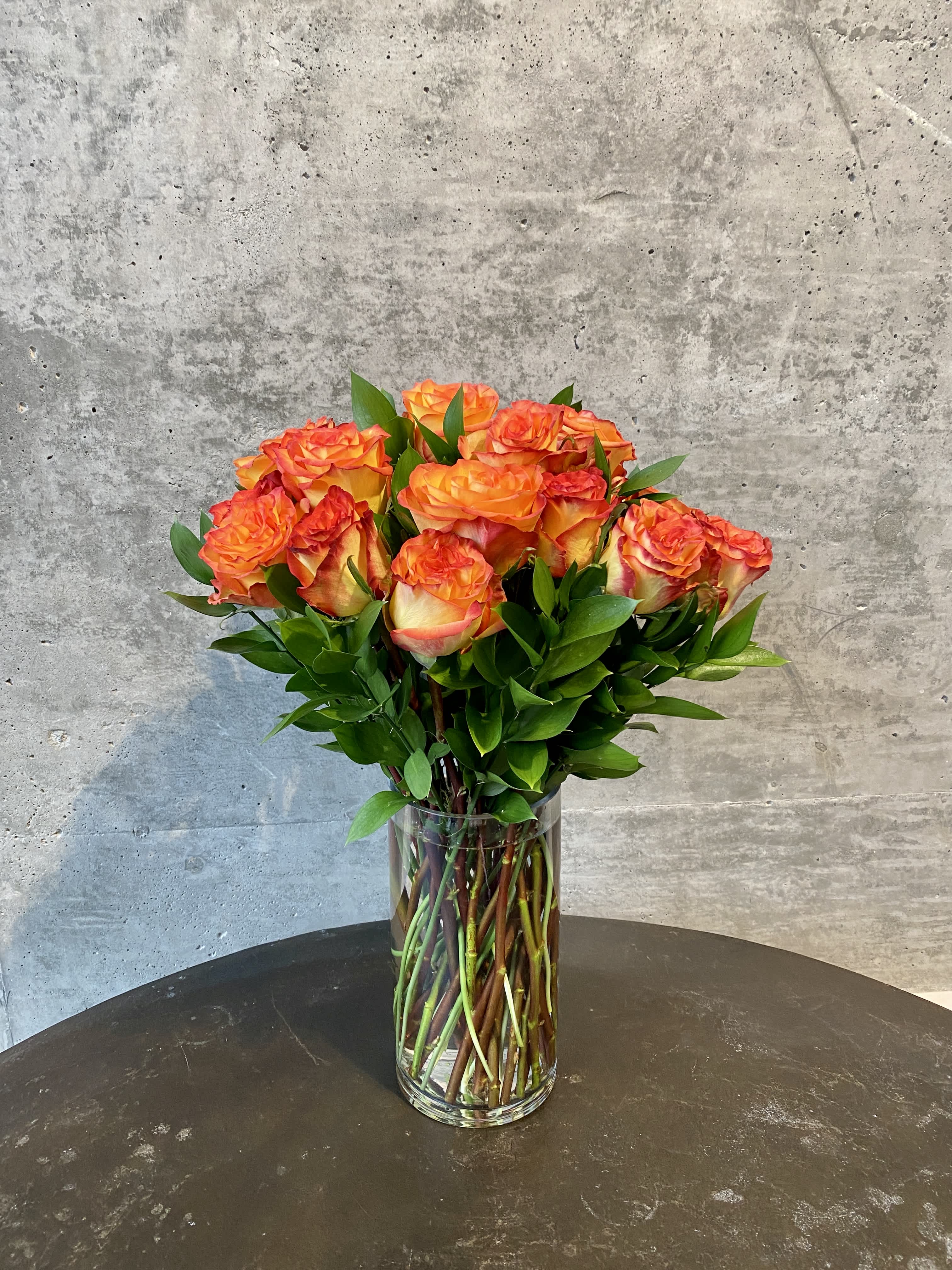 24 Premium Ecuadorian Roses - 24 Premium Grade A Ecuadorian Roses arranged with greenery. Please specify color when ordering. 