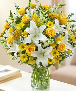 Large Yellow and White Luxury Vase - Large and very full arrangement of lilies, roses, daisies and snap dragons. This is a statement arrangement.