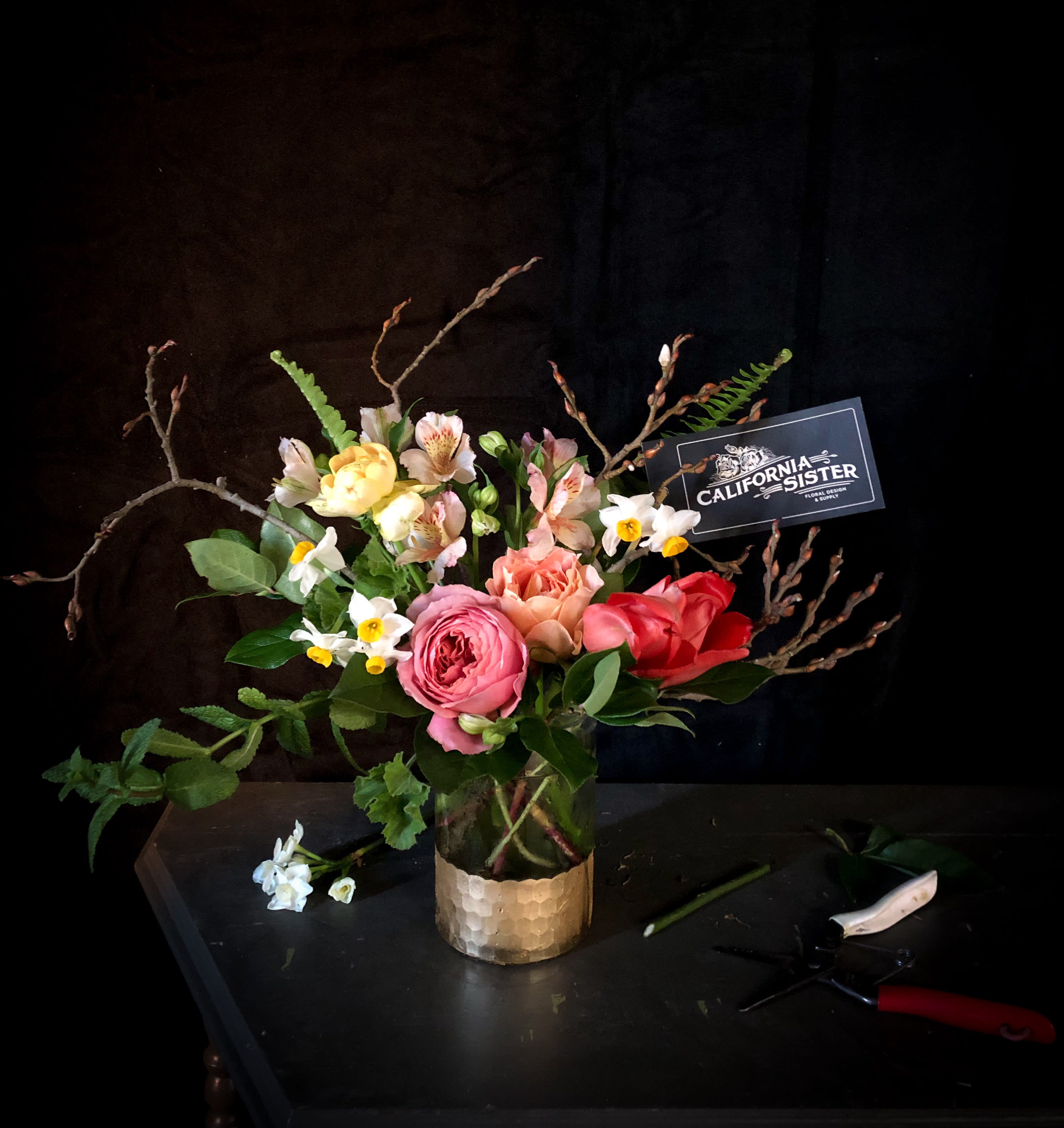 West County Gold - Inspired by the golden hills in the summer, this sweet bouquet is filled with the freshest flowers available along with Heirloom Garden (cabbage style) Roses. Comes in a keepsake Gold glass vase as part of your gift! We send a photo of the actual flowers sent out, so you can see what unique beauty you have brought to your loved one.   **Please Note** We make delivery arrangements with the recipient prior to delivery.  Our top priority is getting your perishable gift safely into the hands of your lucky recipient. We have found even with advance notice, the person receiving beautiful flowers is surprised and delighted upon seeing them for the first time.  We typically deliver between 1-5pm.  -Thank you, California Sister