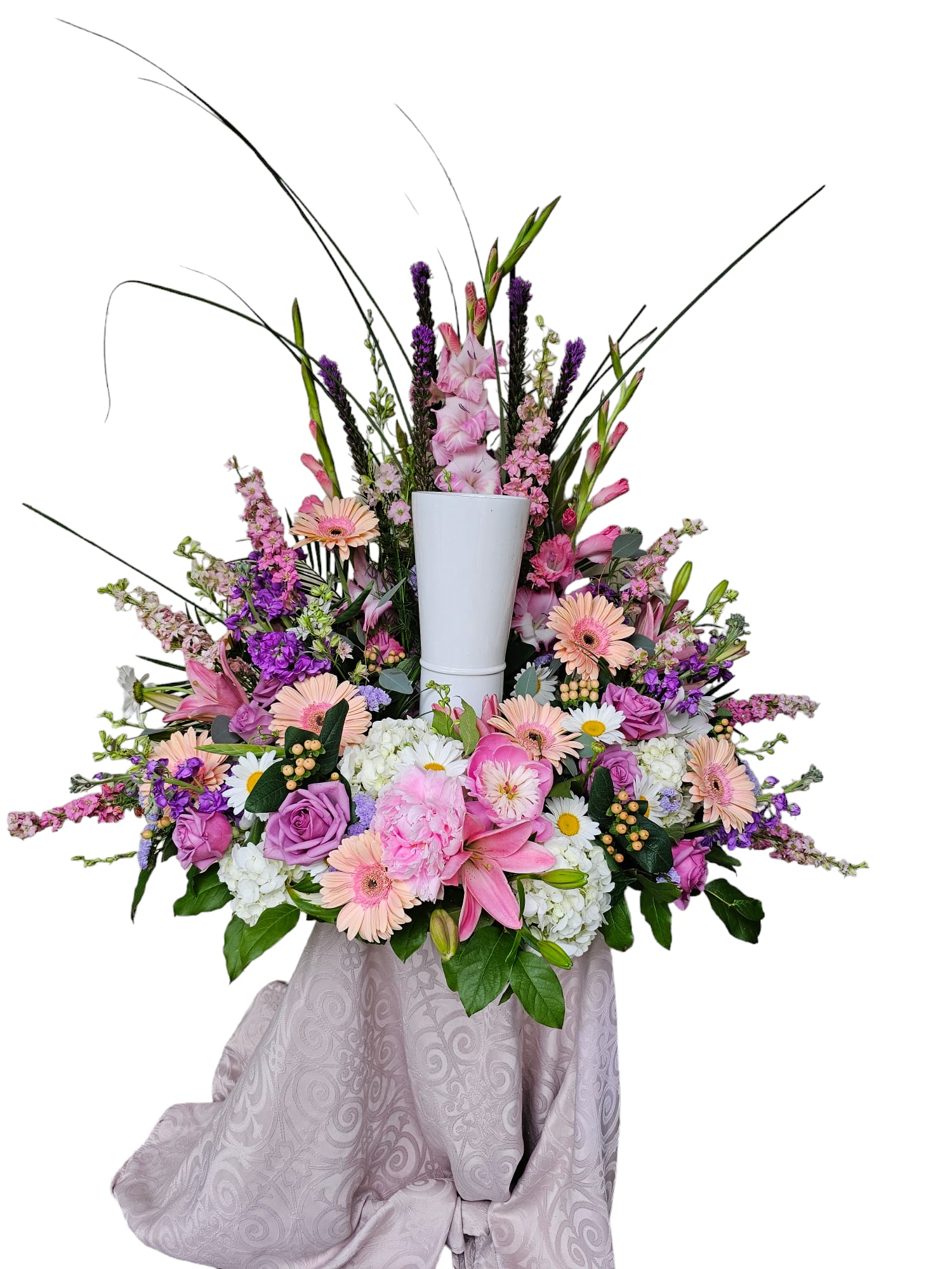Soft pink and purple urn surround Soft pink and purple urn surround - A lovely urn surround using shades of pink and purple flowers.