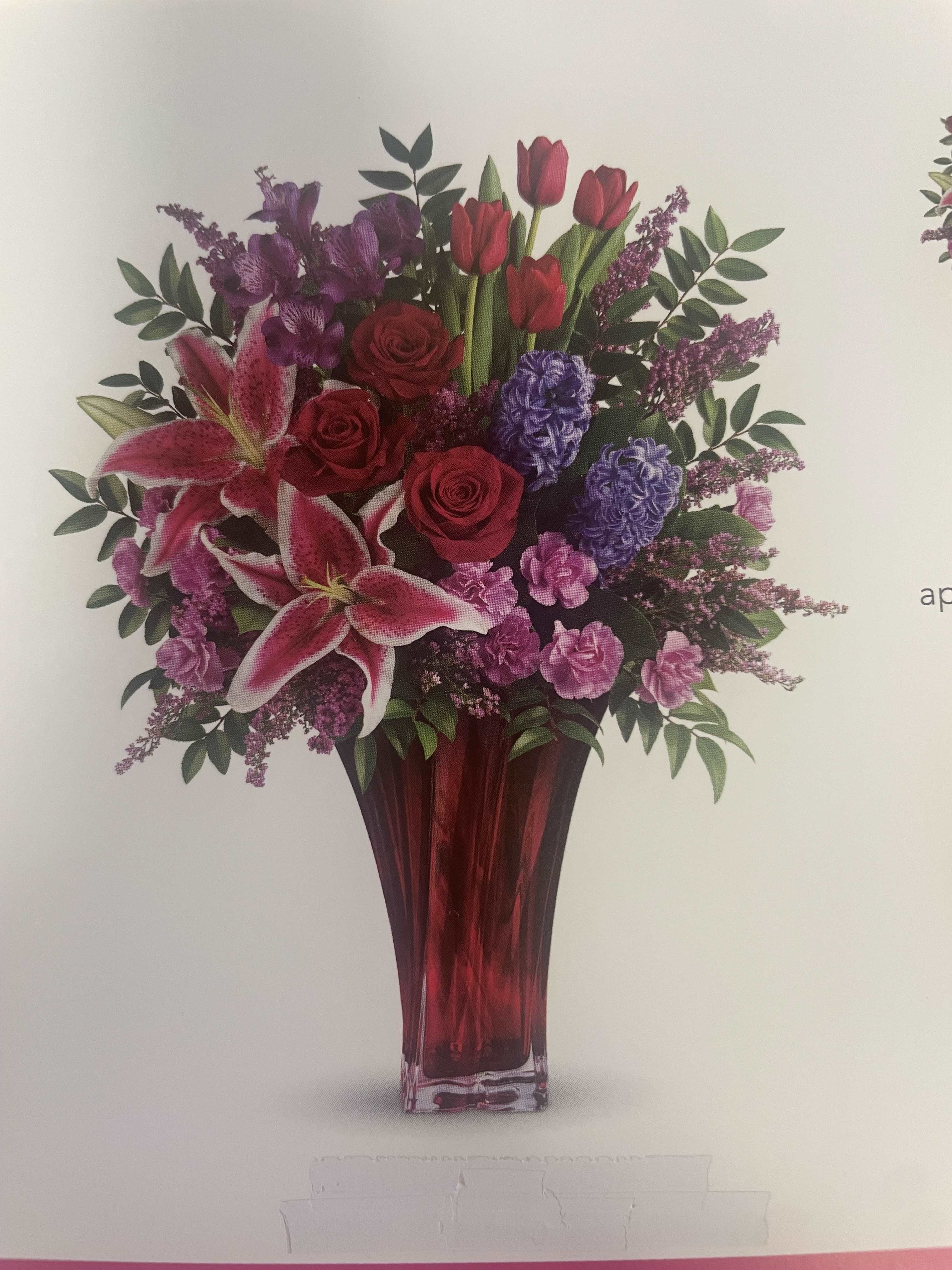 One Love Bouquet - If you want to express love to your special one, this is a great way to do it. Custom made arrangement had higher price.   For custom made arrangement please call the store.  Seasonal flowers and foliage will be substituted.   This arrangement may contain roses, tulips, lilies, stargazer, carnations, lavender, hyacinth, huckleberry, lemon leaf, or others.  Seasonal flowers or foliage will be substituted.  