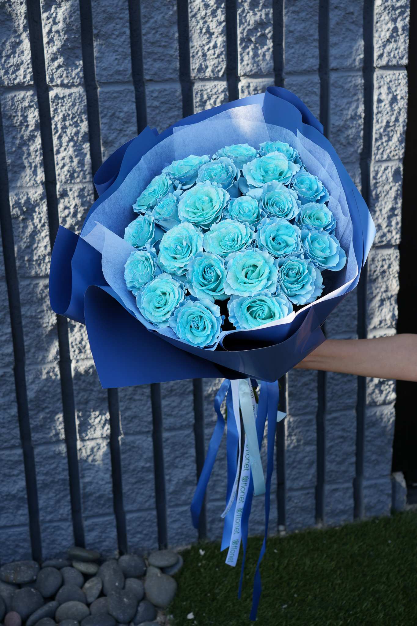 Ocean Dream Bouquet Ocean Dream Bouquet - Dive into the serene beauty of the Ocean Dream Bouquet, an exquisite arrangement that evokes the tranquil allure of the sea. This captivating bouquet features stunning blue roses, meticulously arranged and wrapped in elegant blue paper, creating a mesmerizing display of color and harmony. Perfect for any occasion, from romantic gestures to special celebrations, the Ocean Dream Bouquet brings a touch of elegance and sophistication. Let this unique and enchanting floral arrangement express your deepest sentiments and leave a lasting impression on your loved ones.