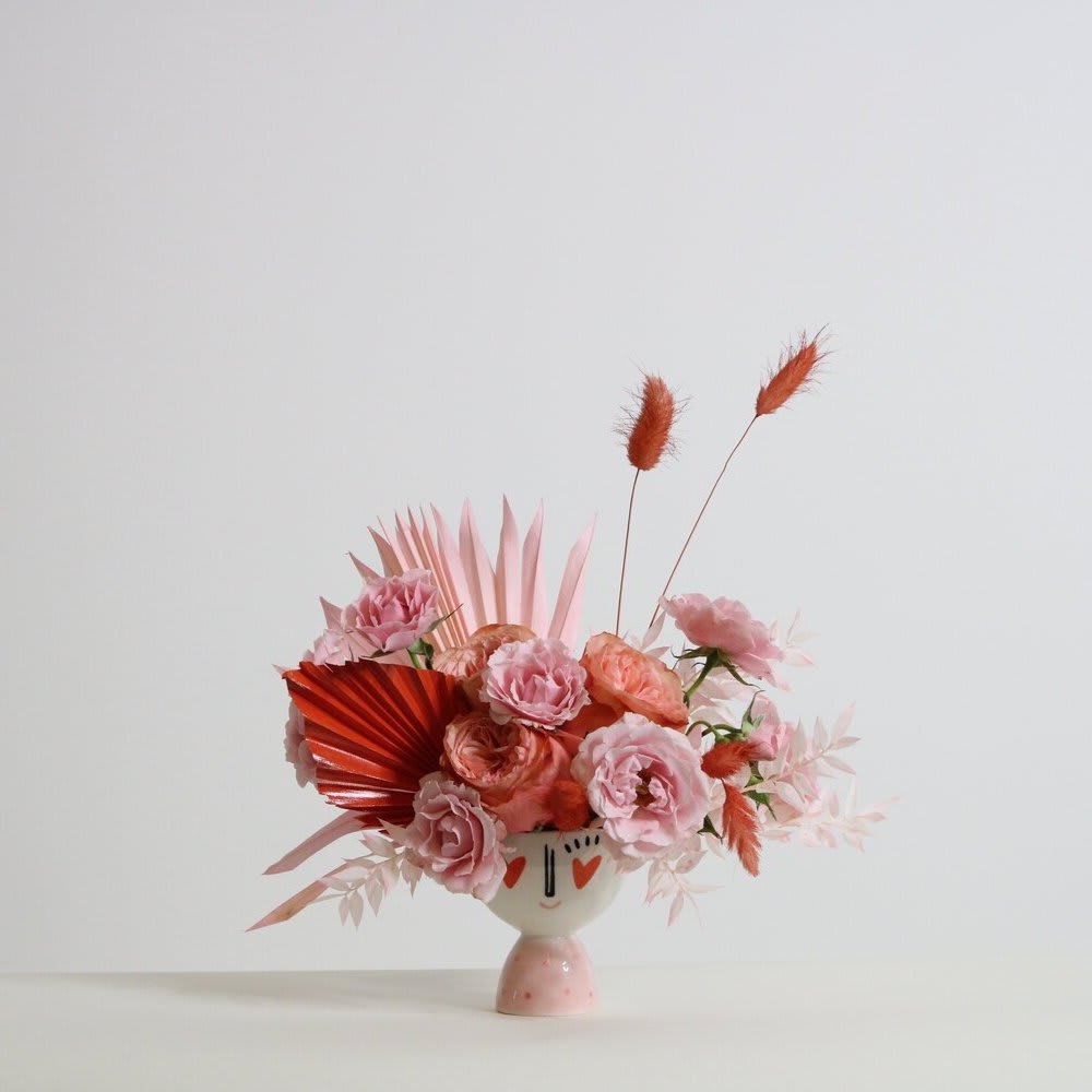 CHIP - - Charming mix of small, delicate blooms - Compact and intricate design - Adds a touch of whimsy to any setting