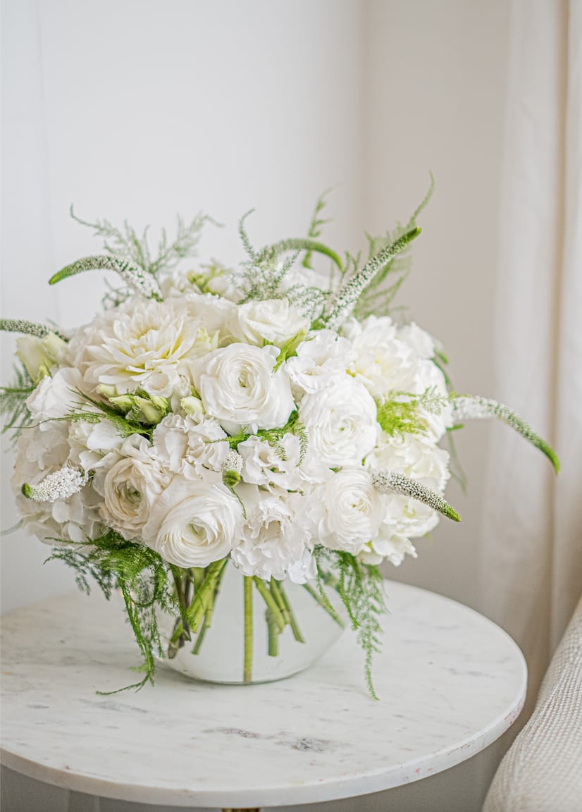 White Angel - This white dahlias and rununculuses arrangement in delicate fresh colors looks very noble and fresh. This is a classic option that will be appropriate in any situation.