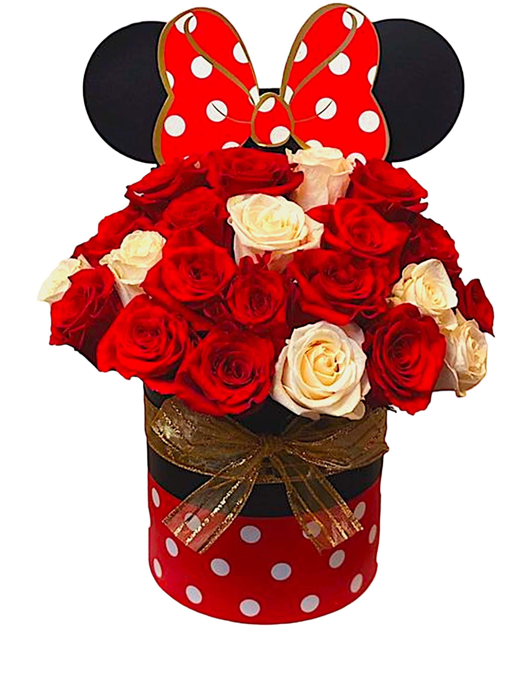 Minnie Mouse Rose Box Arrangement - Send them the magic of Disney with this cute Minnie Mouse modern flower arrangement in a Minnie Mouse box filled with roses.   DETAILS This cylinder box arrangement includes red and white roses.  MINNIE MOUSE BOX CONTAINER INCLUDED Orientation: One-Sided Item #NF-916   FLORIST-TO-DOOR Same day flower delivery on most orders placed online by 12 pm or 10 am on weekends PST.  BLOOM DETAILS Roses  The Standard Arrangement (Shown) 24 Roses The Deluxe Arrangement  The Premium Arrangement   How to place an order? 1. You can place an order directly on this secure website OR 2. You can call in your order by dialing: (323) 262 - 9238 OR 3. You can visit our store (appointment recommended 323.262.9238)  NINFA'S FLOWERS 2405 WHITTIER BLVD. LOS ANGELES, CA. 90023  ATTENTION: *Please note that on busy holidays, Valentine's Day, and Mother's Day, we cannot verify if the recipient received the flowers until the following day. You can verify delivery on the website after 10:00 pm, call 323.262.9238 the following day after 10:00 am, or contact the recipient directly. Thank you for your patience and understanding.