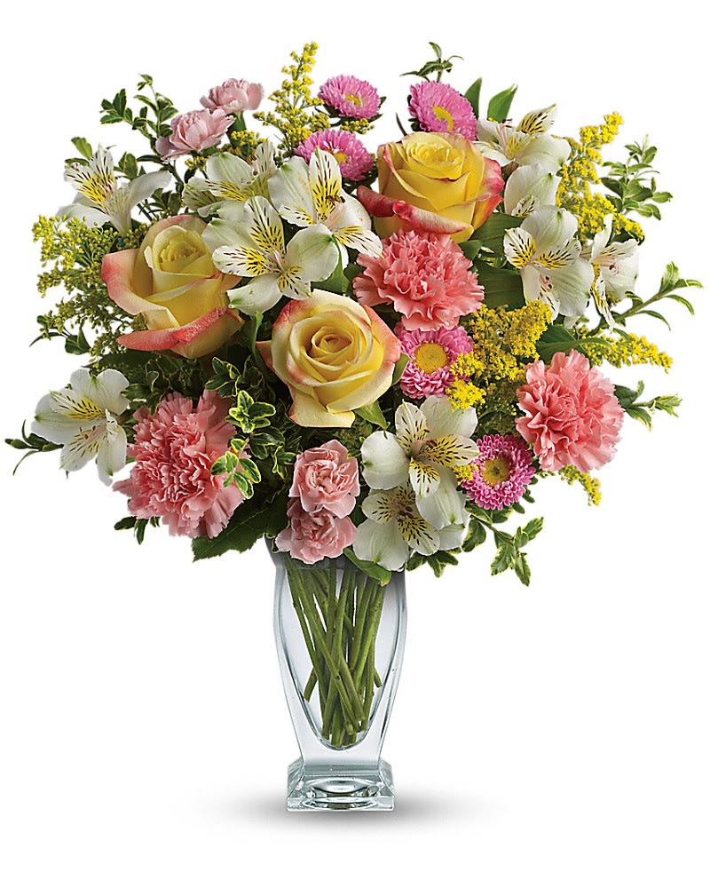 Meant To Be Bouquet by Teleflora - Ring in the spring celebrate a birthday or simply show you care with this gorgeously versatile bouquet. Arranged in a stunning vase they'll always treasure this lovely mix of yellow roses and pink carnations warms everyone's heart. Yellow roses pink carnations white alstroemeria and pink asters are accented with solidago and oregonia. Delivered in a Couture vase.