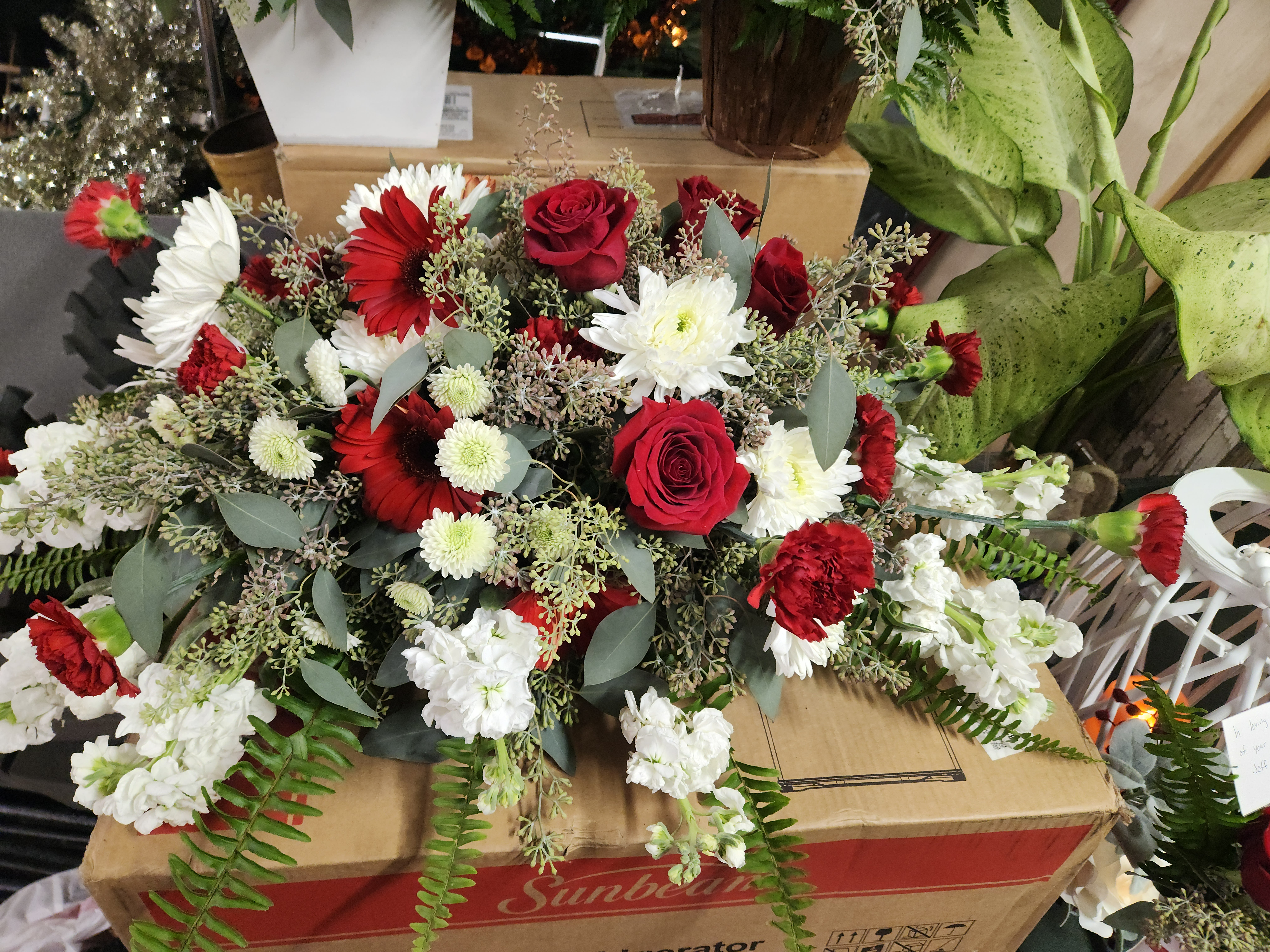 Red and white casket spray - Red and white is stunning on any casket