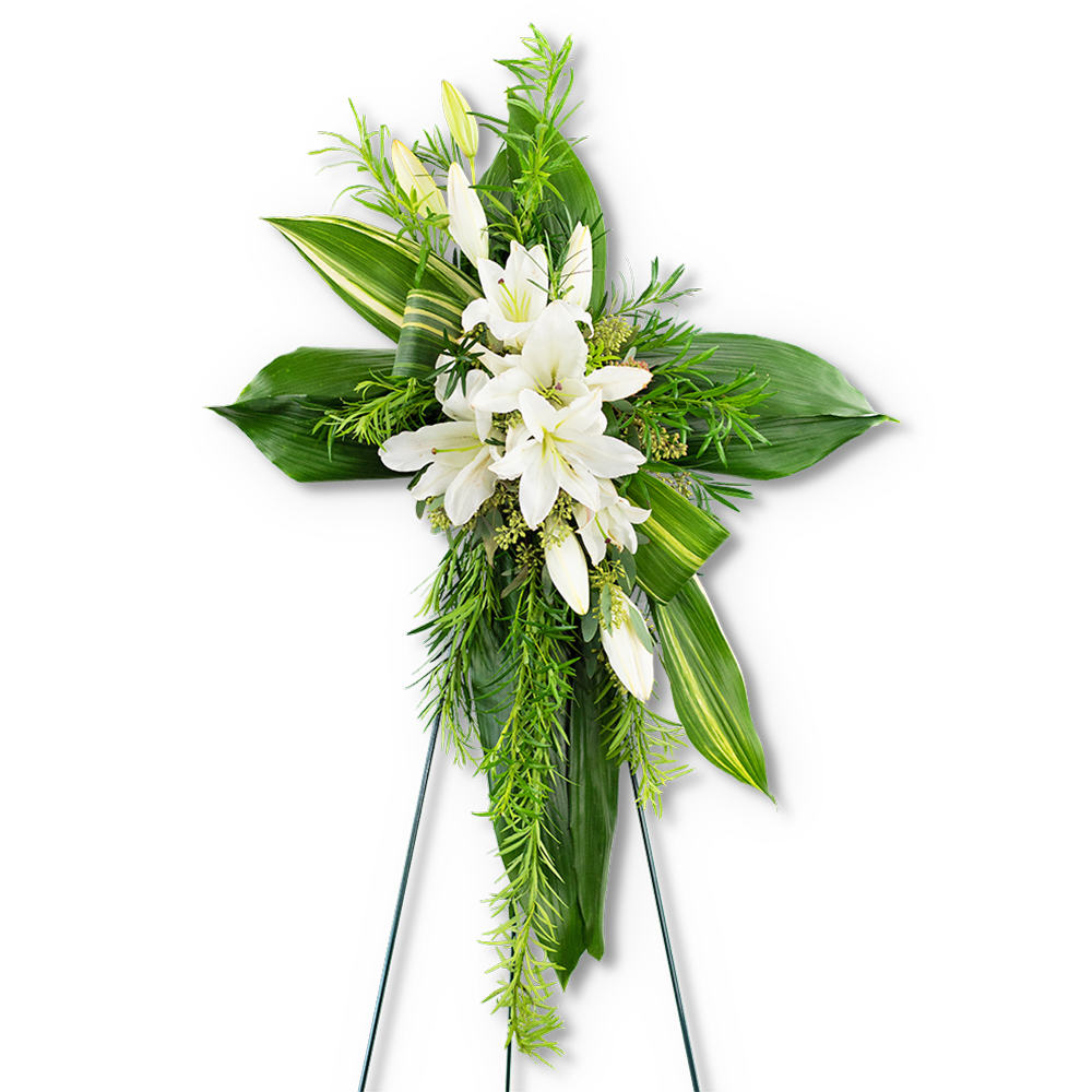 Cross of Comfort Cross of Comfort - Our Cross of Comfort standing spray is the perfect symbol of a loved one’s faith filled life on earth. A variety of textures in premium foliage combine with white oriental lilies to make a stunning and organic cross, made to be displayed near the casket or urn. White flowers are commonly used in sympathy designs, because they convey purity, peace, and love. Sympathy flowers are the perfect way to honor a life or send your condolences to the grieving family.