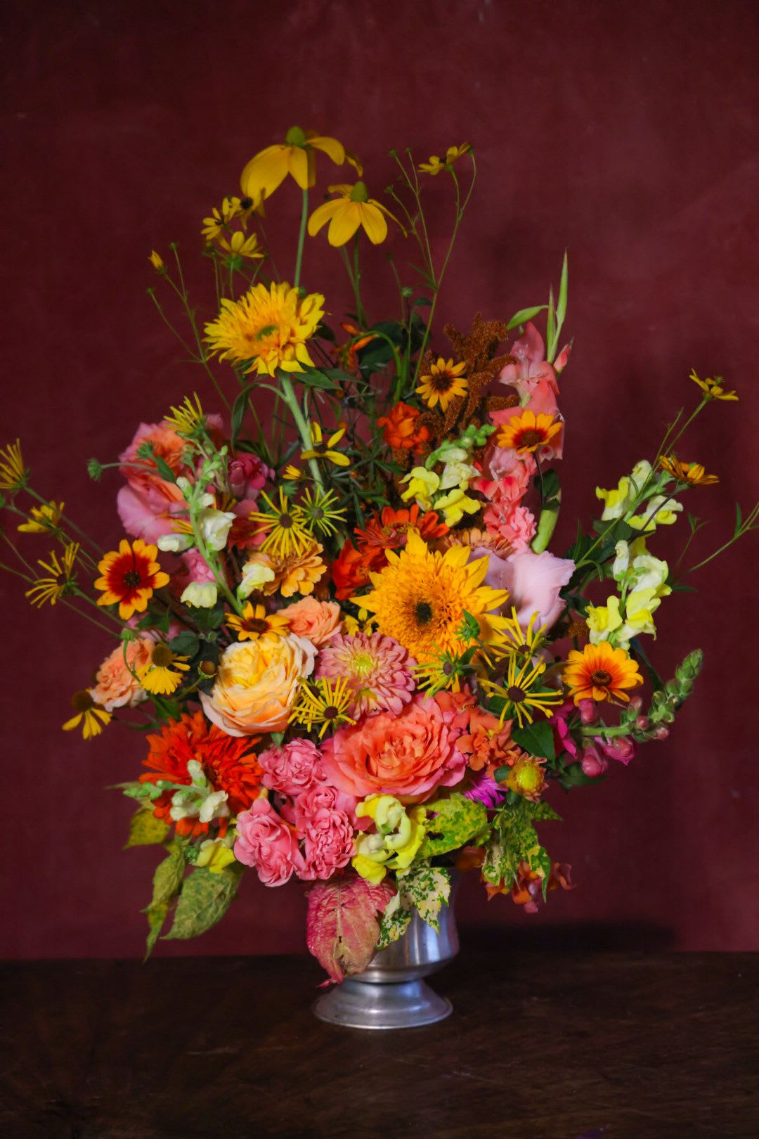 The Summer’s Swan Song Arrangement - With the soaring notes of summer's finale, hints of autumn breathe into the late summery hues. Lavish and vibrant, savor the abundance of the season in this vased tribute to the lushness still within reach of summer.  Custom, one of a kind floral arrangements by floral artist Stacy Leafsong.  Photos provide examples, and each arrangement &amp; vase is unique.  Arrangements will be delivered before 7pm, for specific delivery time please include in special instructions. On holidays, our busiest times, deliveries will be made by 7:30pm.