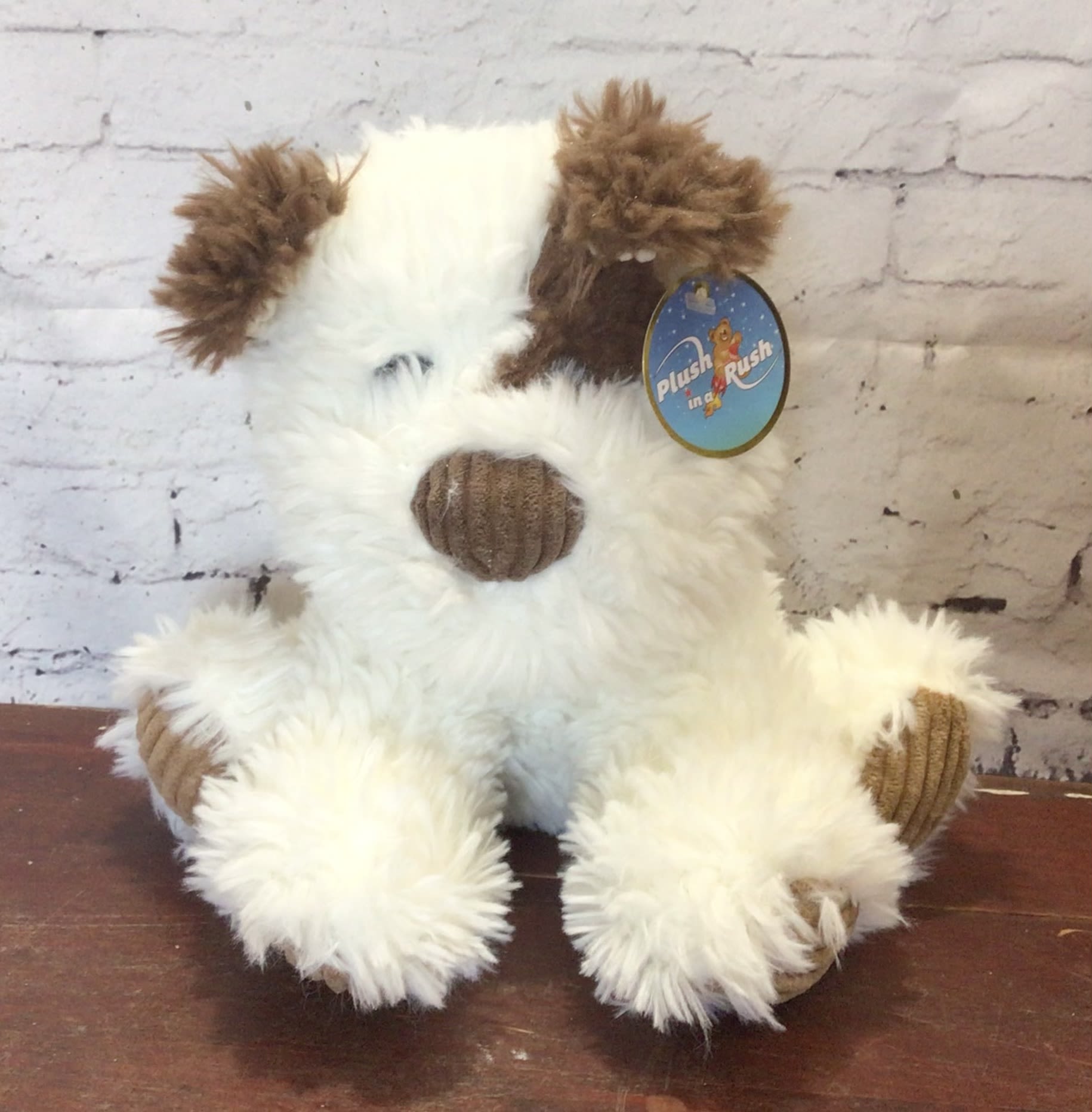 Cuddle Pup - Cuddly, soft plush puppy.