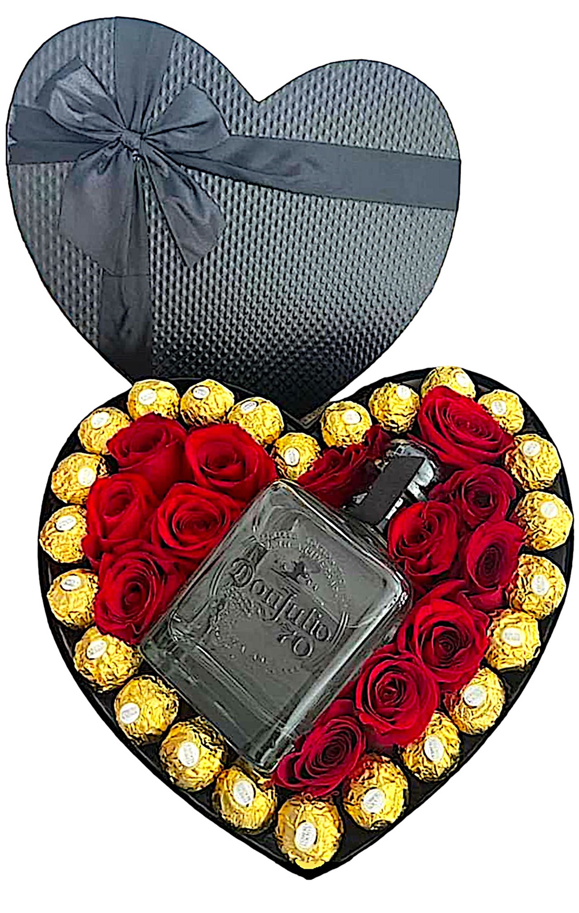 Cheers To You Rose Heart Box - A modern flower arrangement in a heart box filled with roses &amp; Ferrero Rocher Chocolates. Alcoholic Bottle NOT INCLUDED. (You must provide the bottle. You can drop off the bottle and add delivery fee if you wish to have us deliver it. This item is Pick-Up if not adding the deliver fee at time of dropping off the bottle.  DETAILS This heart box arrangement includes red roses and for an extra treat, Ferrero Rocher Chocolates. DOES NOT INCLUDE THE BOTTLE.  HEART BOX INCLUDED Orientation: All-Around Upright Item #NF-325  FLORIST-TO-DOOR Same day flower delivery on most orders placed online by 12 pm or 10 am on weekends PST.  BLOOM DETAILS Red Roses  The Standard Arrangement - 13 Red Roses &amp; 24 Ferrero Rocher Chocolates (SHOWN)  How to place an order? 1. You can place an order directly on this secure website OR 2. You can call in your order by dialing: (323) 262 - 9238 OR 3. You can visit our store (appointment recommended 323.262.9238)  NINFA'S FLOWERS 2405 WHITTIER BLVD. LOS ANGELES, CA. 90023  ATTENTION: *Please note that on busy holidays, Valentine's Day, and Mother's Day, we cannot verify if the recipient received the flowers until the following day. You can verify delivery on the website after 10:00 pm, call 323.262.9238 the following day after 10:00 am, or contact the recipient directly. Thank you for your patience and understanding.