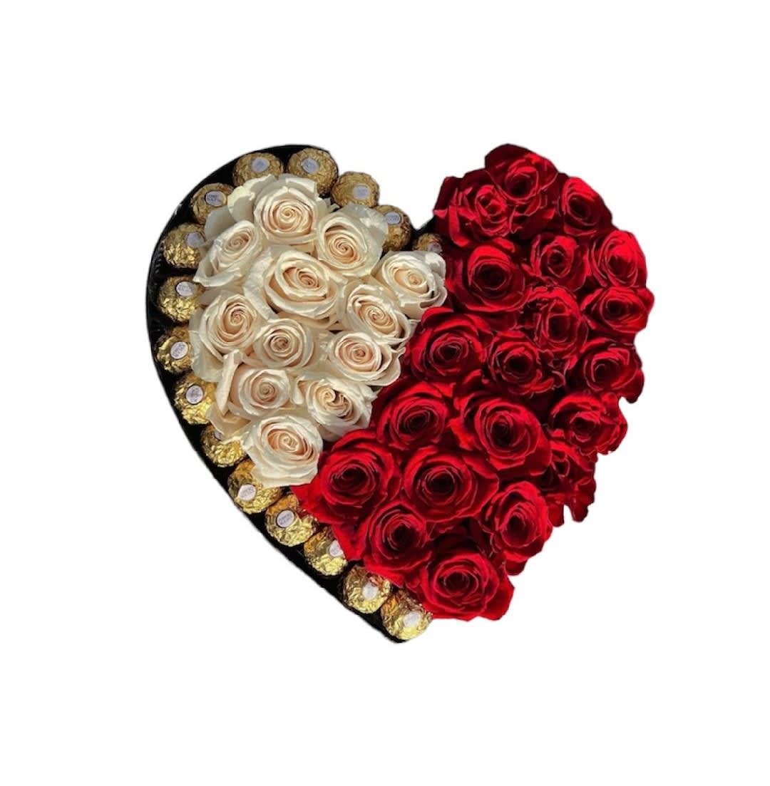 White and Red Roses Heart Box Arrangement - A modern flower arrangement in a heart box filled with roses and Ferrero Rocher chocolates.   DETAILS This heart box arrangement includes white roses, red roses, and Ferrero Rocher Chocolates.  HEART BOX INCLUDED Orientation: One-Sided Item #NF-330  FLORIST-TO-DOOR Same day flower delivery on most orders placed online by 12 pm or 10 am on weekends PST.  BLOOM DETAILS Red Roses  White Roses  The Standard Arrangement includes: 12 White Roses, 20 Red Roses, &amp; 16 Ferrero Rocher Chocolates.  How to place an order? 1. You can place an order directly on this secure website OR 2. You can call in your order by dialing: (323) 262 - 9238 OR 3. You can visit our store (appointment recommended 323.262.9238)  NINFA'S FLOWERS 2405 WHITTIER BLVD. LOS ANGELES, CA. 90023  ATTENTION: *Please note that on busy holidays, Valentine's Day, and Mother's Day, we cannot verify if the recipient received the flowers until the following day. You can verify delivery on the website after 10:00 pm, call 323.262.9238 the following day after 10:00 am, or contact the recipient directly. Thank you for your patience and understanding.