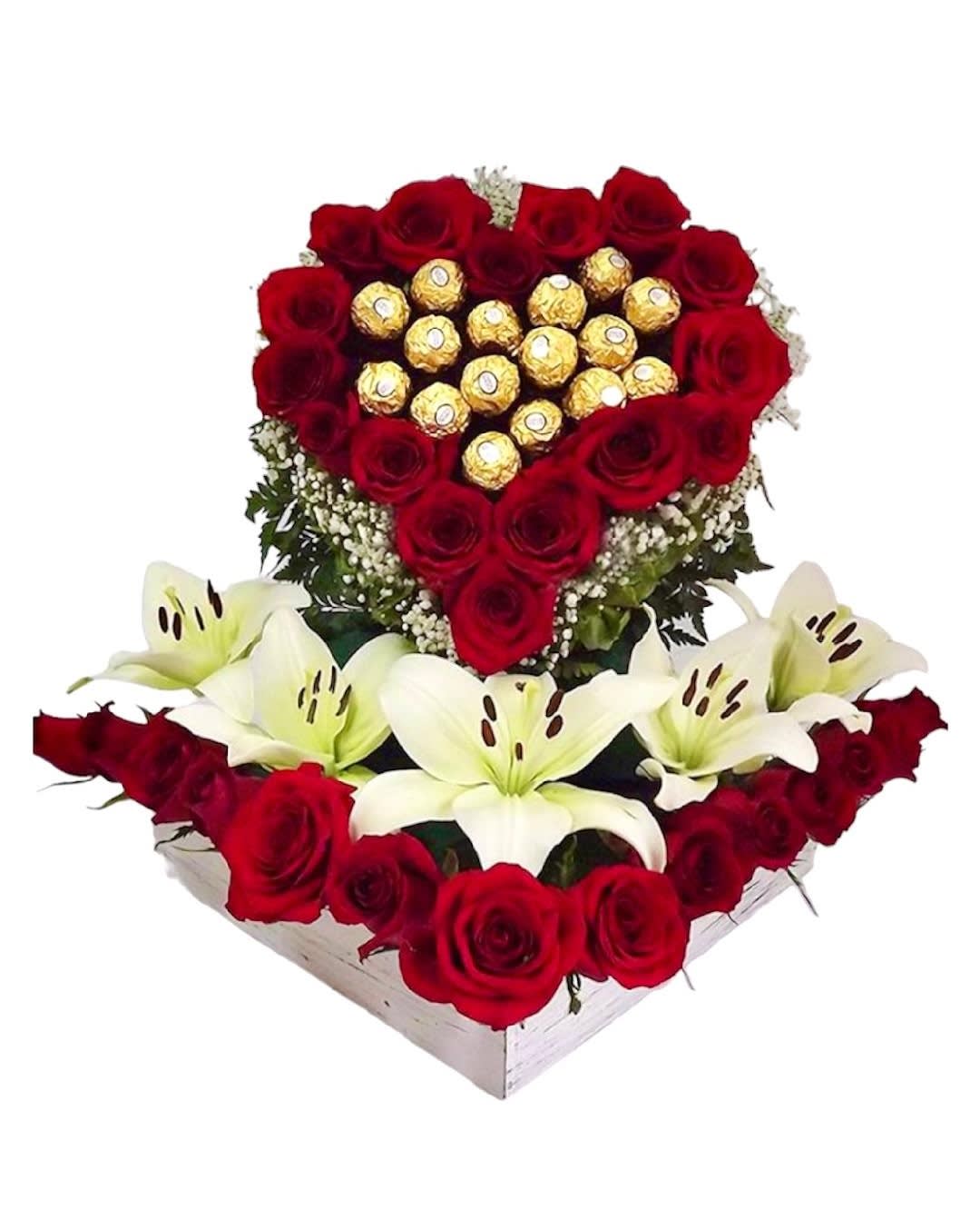 You Hold My Heart  - What a beautiful arrangement - with this lovely arrangement they will hold your heart near and dear!   DETAILS This romantic arrangement includes red roses, white Asiatic lilies, Ferrero Rocher Chocolates, and baby's breath filler and is accented with assorted greenery.  CONTAINER BOX INCLUDED Orientation: One-Sided Item #NF-881  FLORIST-TO-DOOR Same day flower delivery on most orders placed online by 12 pm or 10 am on weekends PST.  BLOOM DETAILS Roses  Asiatic Lilies Greenery  The Standard Arrangement - 31 Red Roses, 5 White Asiatic Lily Blooms, 16 Ferrero Rocher Chocolates (SHOWN) The Deluxe Arrangement - 34 Red Roses, 7 White Asiatic Lily Blooms, 17 Ferrero Rocher Chocolates (SHOWN) The Premium Arrangement - 37 Red Roses, 9 White Asiatic Lily Blooms, 18 Ferrero Rocher Chocolates   How to place an order? 1. You can place an order directly on this secure website OR 2. You can call in your order by dialing: (323) 262 - 9238 OR 3. You can visit our store (appointment recommended 323.262.9238)  NINFA'S FLOWERS 2405 WHITTIER BLVD. LOS ANGELES, CA. 90023  ATTENTION: *Please note that on busy holidays, Valentine's Day, and Mother's Day, we cannot verify if the recipient received the flowers until the following day. You can verify delivery on the website after 10:00 pm, call 323.262.9238 the following day after 10:00 am, or contact the recipient directly. Thank you for your patience and understanding.
