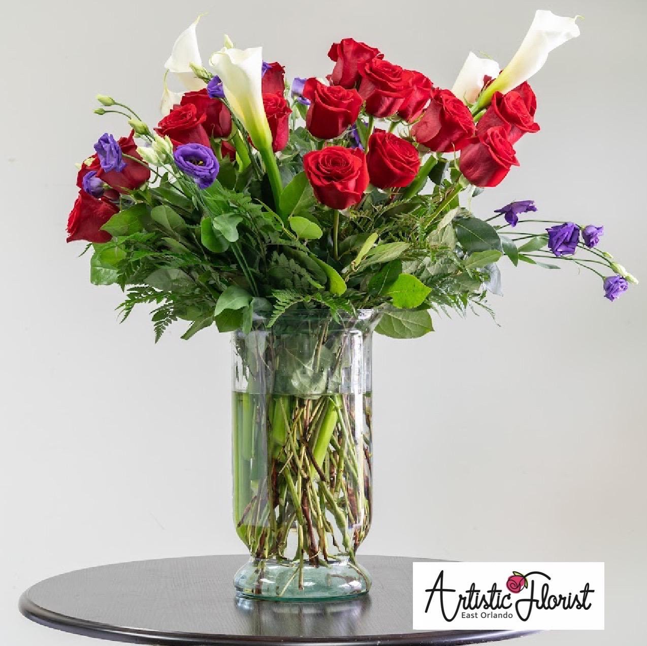 Lovely Vision Lovely Vision - These beautiful arrangements pair the sleek, sophisticated calla lilies with timeless romance of roses, creating a truly unforgettable gift