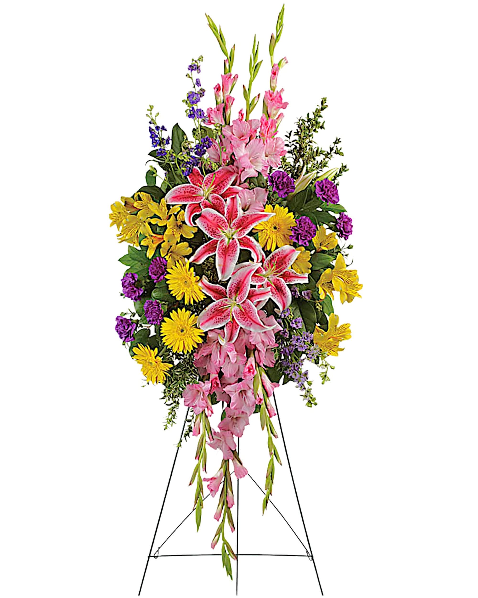 Rainbow of Remembrance Standing Spray - Your sincere wishes for peace and harmony resonate beautifully in this perfectly balanced arrangement of pink lilies, yellow gerberas and purple larkspur. A grand display appropriate for the funeral home, memorial service, or gravesite.  DETAILS This inspiring spray includes pink stargazer lilies, yellow gerberas, yellow alstroemeria, pink gladioli, purple carnations and purple larkspur accented with Oregonia and lemon leaf.   EASEL INCLUDED Orientation: One-Sided *If you would like to add a ribbon with a sentiment for an additional $10 each. Item #NF-1097  FLORIST-TO-DOOR Same day flower delivery on most orders placed online by 12 pm or 10 am on weekends PST.  BLOOM DETAILS Gladiolas Larkspur Gerbera Daisies Stargazer Lilies Carnations Alstroemerias Greenery  The Standard Arrangement is approx.55&quot;H x 24&quot;W (without stand) (SHOWN) The Deluxe Arrangement is approx. 58&quot;H x 26&quot;W (without stand) The Premium Arrangement is approx. 62&quot;H x 28&quot;W (without stand)  INSTRUCTIONS: 1.) Please have the business name of the funeral home, address &amp; phone number. 2.) Please have the first name &amp; last name of the deceased. 3.) Please have the start time of the services. 4.) If you would like for us to write a brief message on a small business card-size note, please have your message ready.  NINFA'S FLOWERS 2405 WHITTIER BLVD. LOS ANGELES, CA. 90023