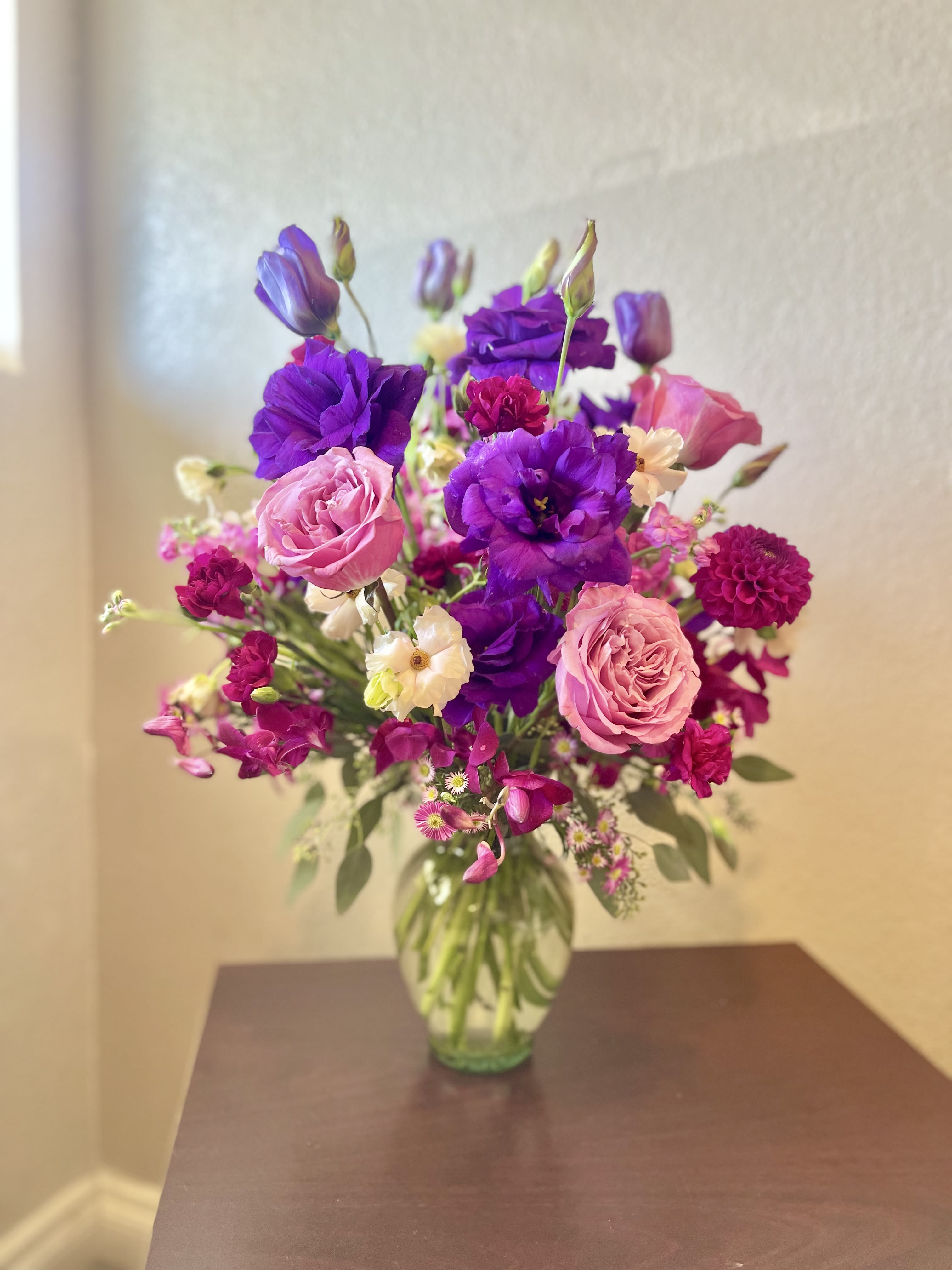 I love you Pookie - A classic design that is elegant and sophisticated. The beautiful purple hues with just a touch of pink and white hues come together to make this stunning arrangement are sure to put a smile on Pookie's face. In a clear 9.5&quot; glass vase. 