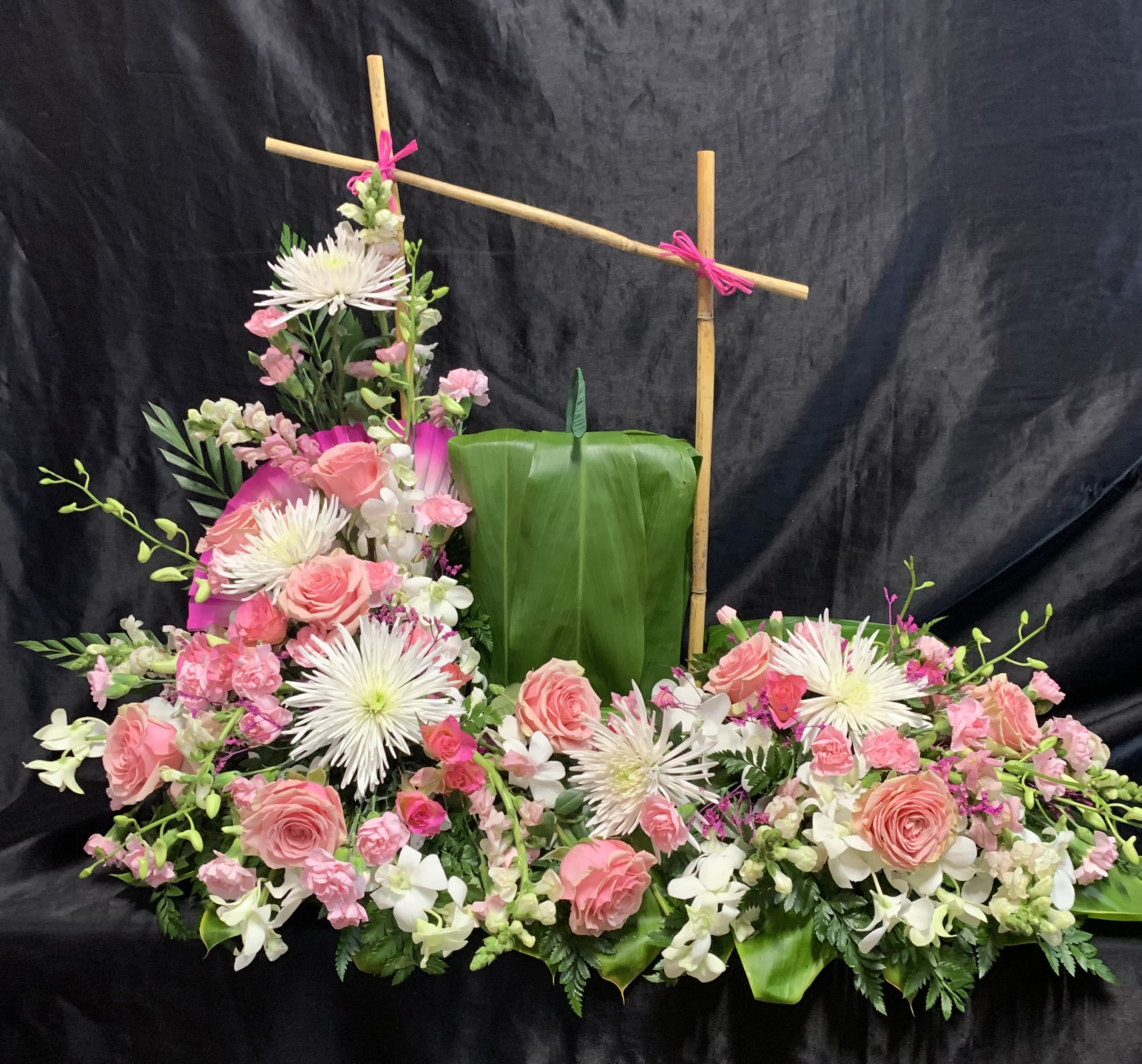 ORIENTAL (Picture /URN GARDEN).  UG  #O8 - Bamboo &amp; Decorative Fan  accent  Large white Mums, carnations &amp; Orchid sprays.   ** need for seasonal availability:   Oriental lily,   Hydrangea , &amp; Snapdragons  as substitutions   Size of. Urn  and  picture frame please   We can design in different colors:  Reds, or Purple,  Orange, or Yellow  or just all white and just adding a touch of color …. Please ask our designers 