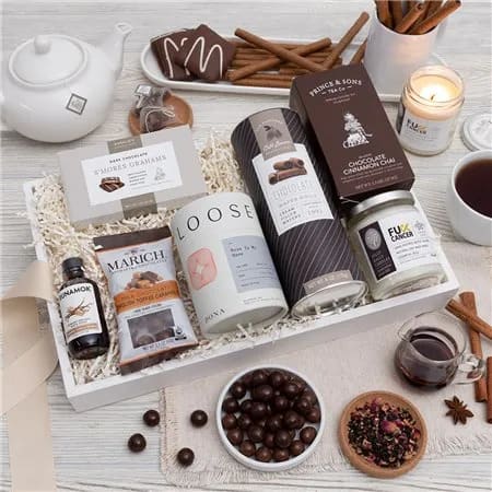 Thinking of You - When you want to show someone you care and are thinking of them during a difficult time, our Thinking of You Comfort Crate is the perfect solution. This thoughtful package is designed to provide comfort and support, featuring a soothing vanilla-scented candle, chair tea and loose-leaf for warm and comforting beverages, and an assortment of delicious chocolate snacks, including S'mores Grahams, English toffee caramels, and wafer rolls. Show someone that you are there for them even when you can't be there in person.