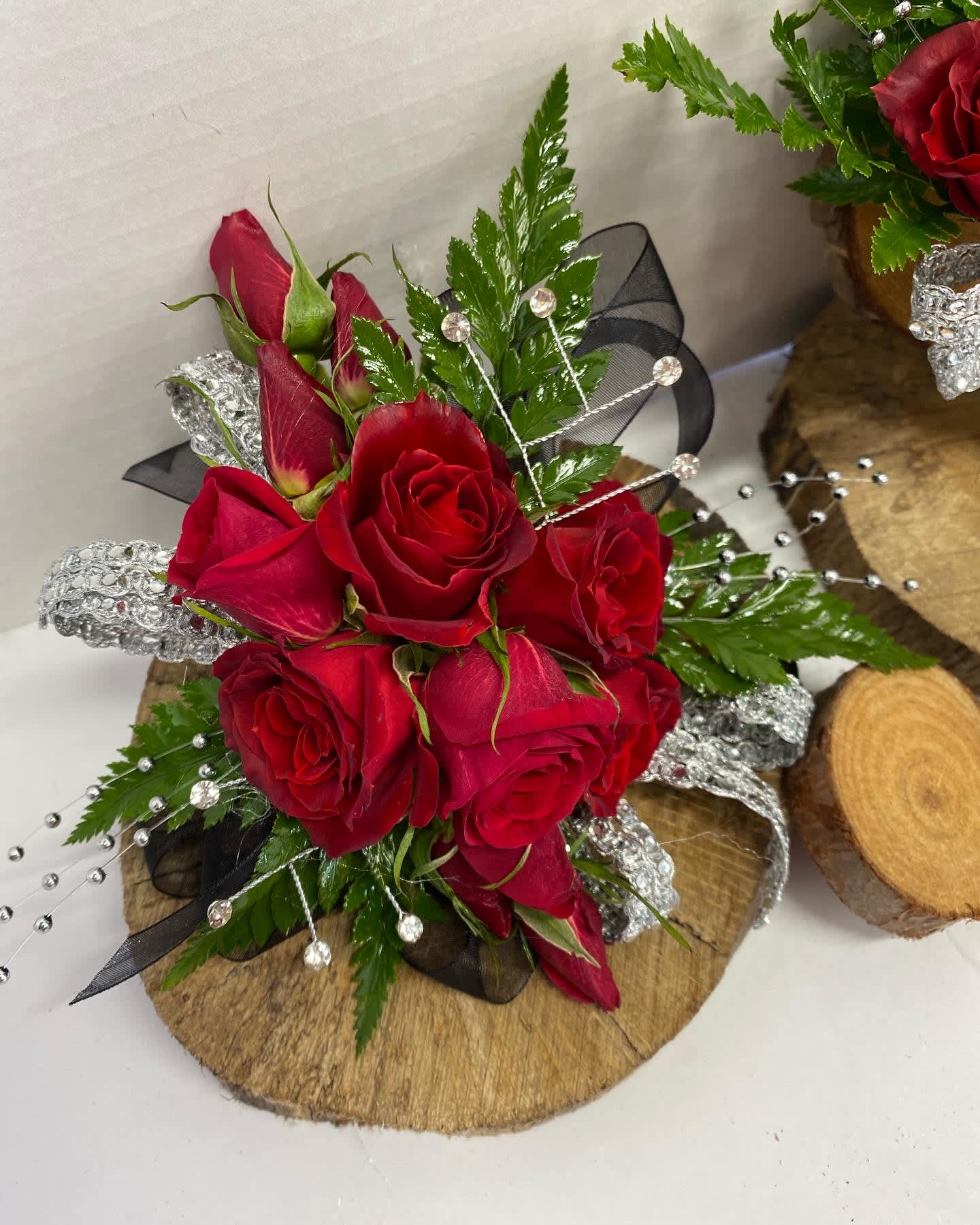 SR Custom Wristlet Corsage (Exclusive) - All corsages are custom made to order. PLEASE WHEN ORDERING PUT IN NOTES TO SHOP THE FOLLOWING: *Ribbon color/dress color *Jewelry color for accent * Gentlemen's suit or shirt color *Approximate pick up time  