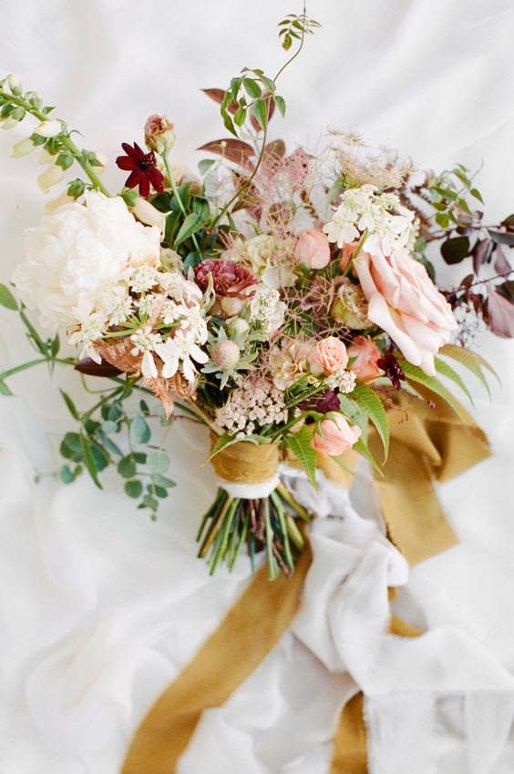 Organic, Hand tied Bouquet - This is just an example of the style. Organic, hand tied bouquet Flora Roots &amp; Co. offers Kindly fill out our wedding consultation form to inquire about exact pricing also we can set up a phone consultation to discuss any specifications, options &amp; color palettes.  These are strictly inspirational photos. Blooms pictured may not be available based on seasonality or availability. Any modifications made will honor the palette, intent, and feeling of the pictured design. 