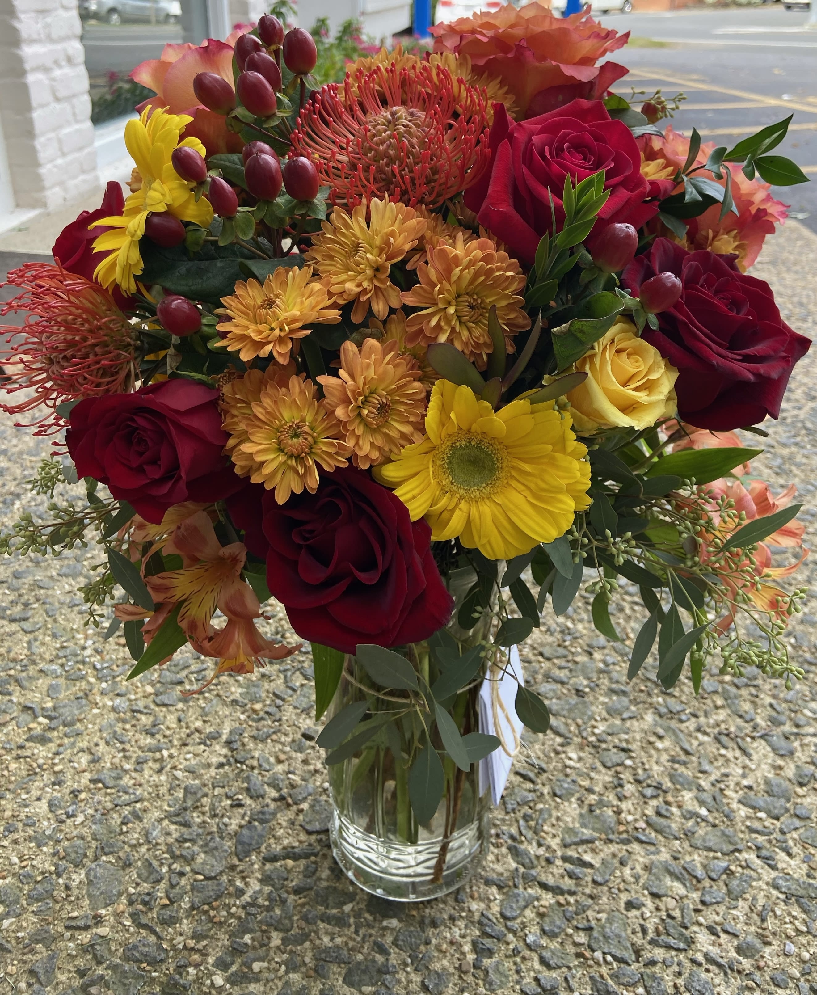 Fall Spice Fall Spice - With roses and daises, this arrangement encapsulates the seasons best colors!