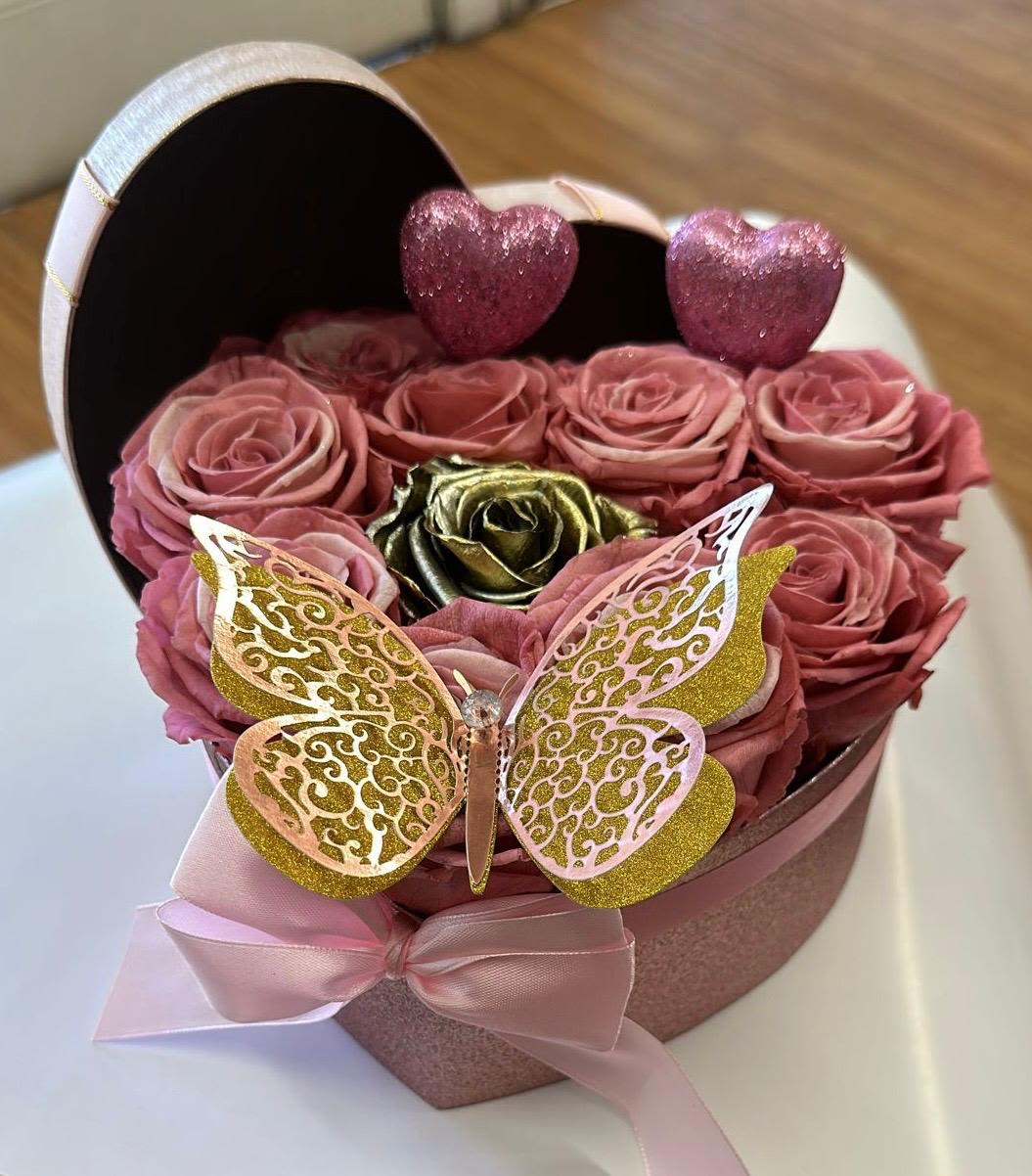 Eternal Heart MD Eternal Heart MD - An artistic and brilliant arrangement, this crowd pleaser is as interesting as it is stunning and handmade, containing 10 preserved natural roses that have a 5-year shelf life.