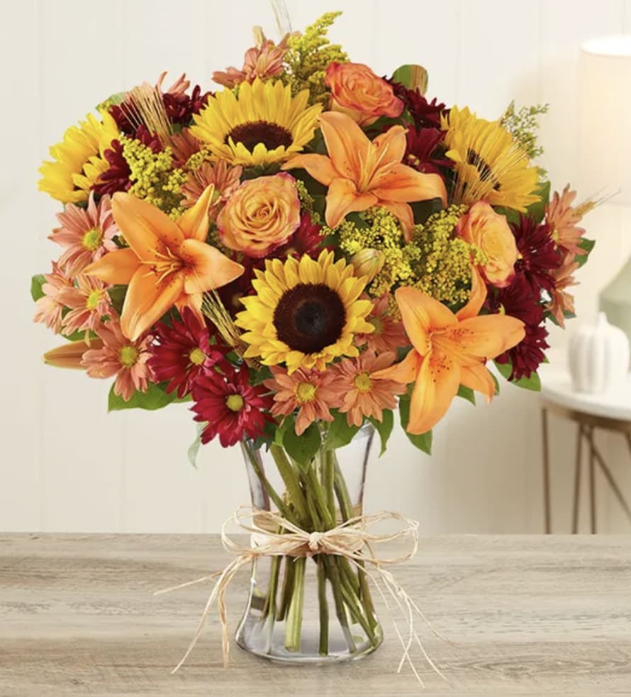 Fields of Europe for Fall - Inspired by the colorful charm of the European countryside, our best-selling autumn bouquet is gathered with fresh-picked flowers, revealing the rustic beauty of nature. Shades of golden yellow, rich red and pops of orange create a timeless gift for someone special to enjoy.