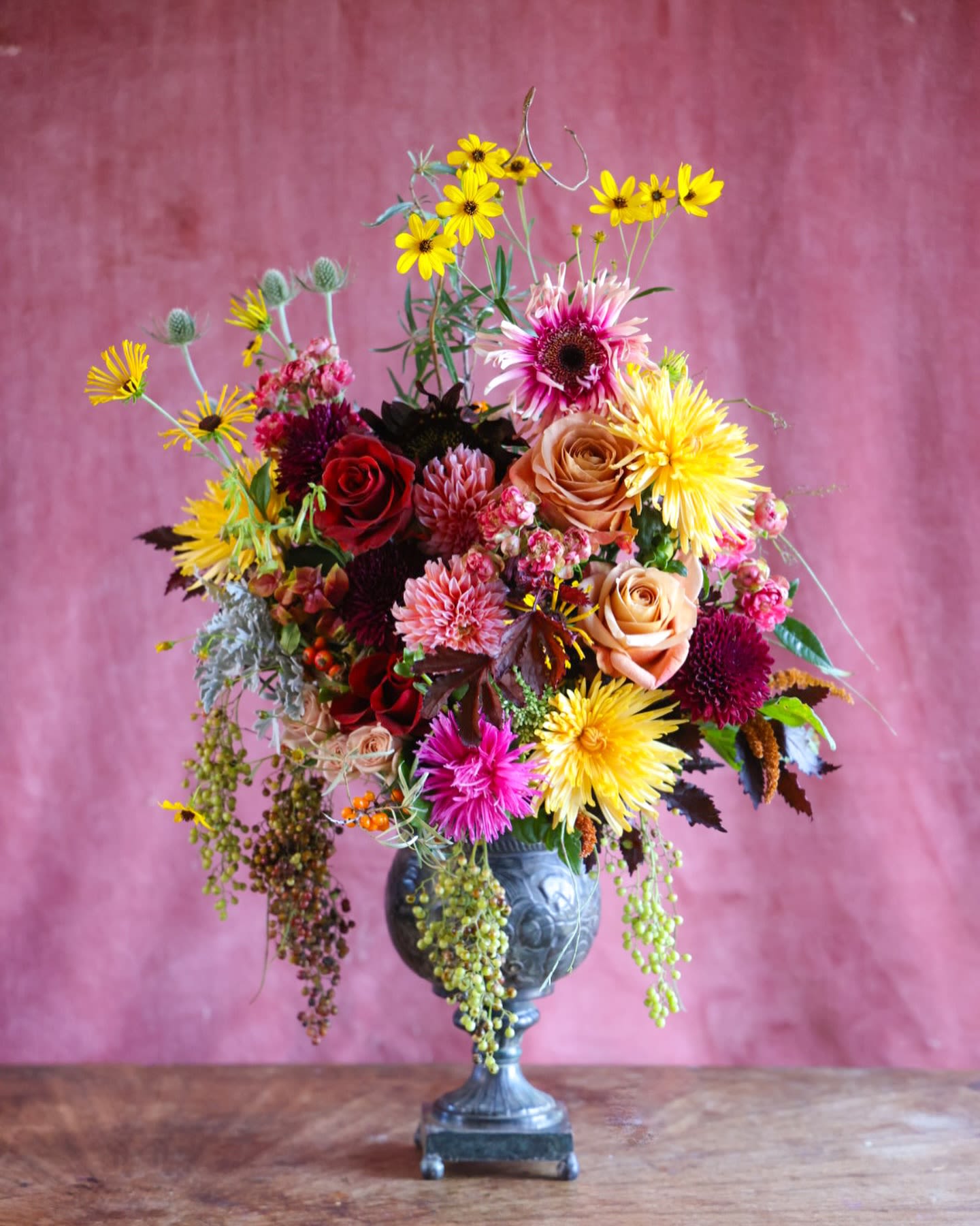 The Lunasa Arrangement - Lunasa, the Gaelic holiday that marks the start of the harvest, autumn and the wane of summer. Honor the turning of the season, with this floral that stirs the senses of the changing of the seasons. Raspberry, cacao, gold and crushed purple, are some of the hues that embibe this floral work.  Custom, one of a kind floral arrangements by floral artist Stacy Leafsong.  Photos provide examples, and each arrangement &amp; vase is unique.  Arrangements will be delivered before 7pm, for specific delivery time please include in special instructions. On holidays, our busiest times, deliveries will be made by 7:30pm.  