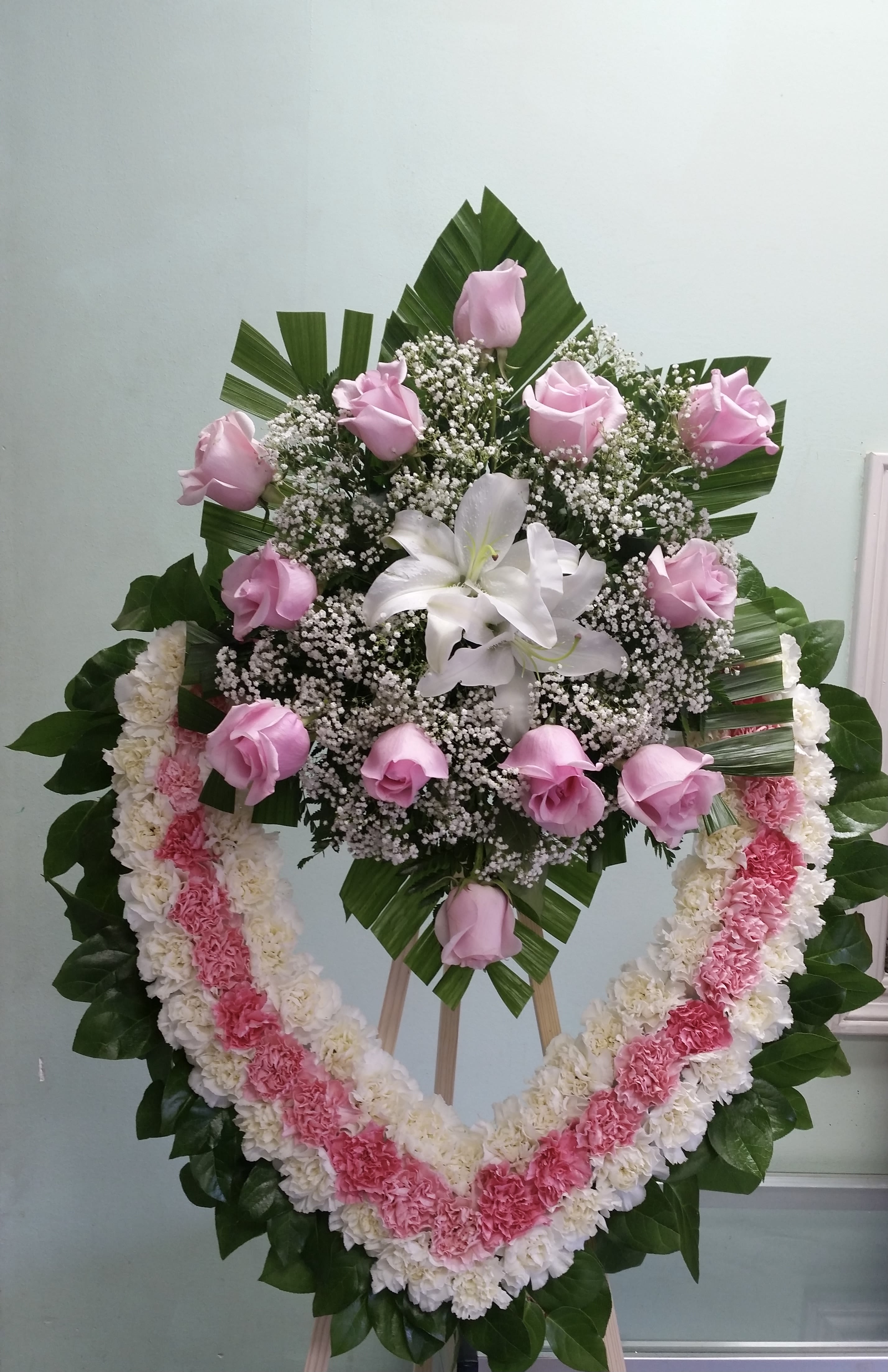 Tribute of Faith Heart Tribute of Faith Heart - Open heart with pink and white carnations, pink roses, and white lilies.
