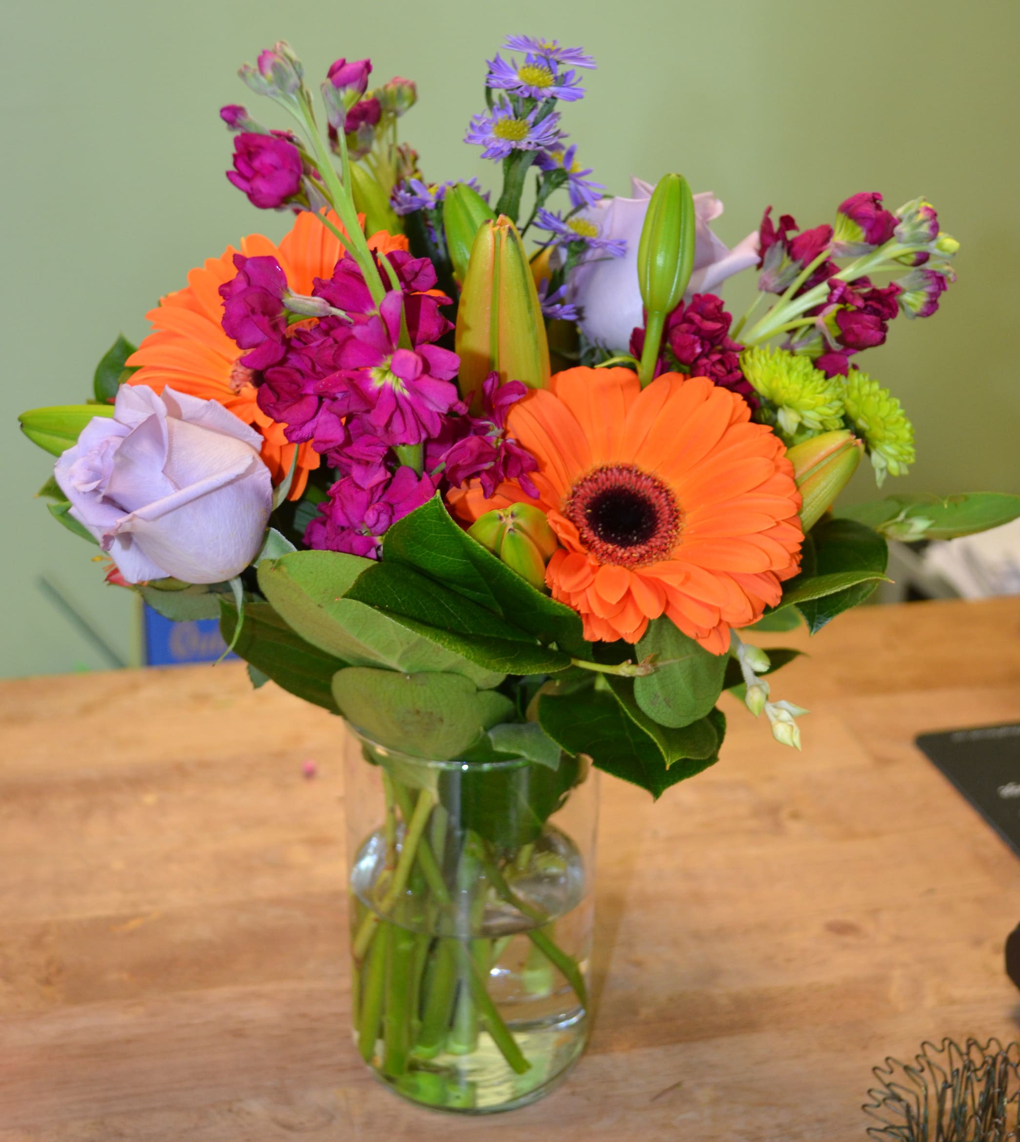 Some Dazzling Morning - Gerbera Daisies, Stock, Roses, Lilies and more in this cheerful arrangement.