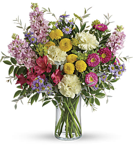 Goodness And Light Bouquet Goodness And Light Bouquet - Add a healthy dose of goodness and light to someone's day with this colorful bouquet! Its bountiful blend of alstroemeria, stock and asters in cheerful shades of pink, yellow and lavender is sure to make them smile.