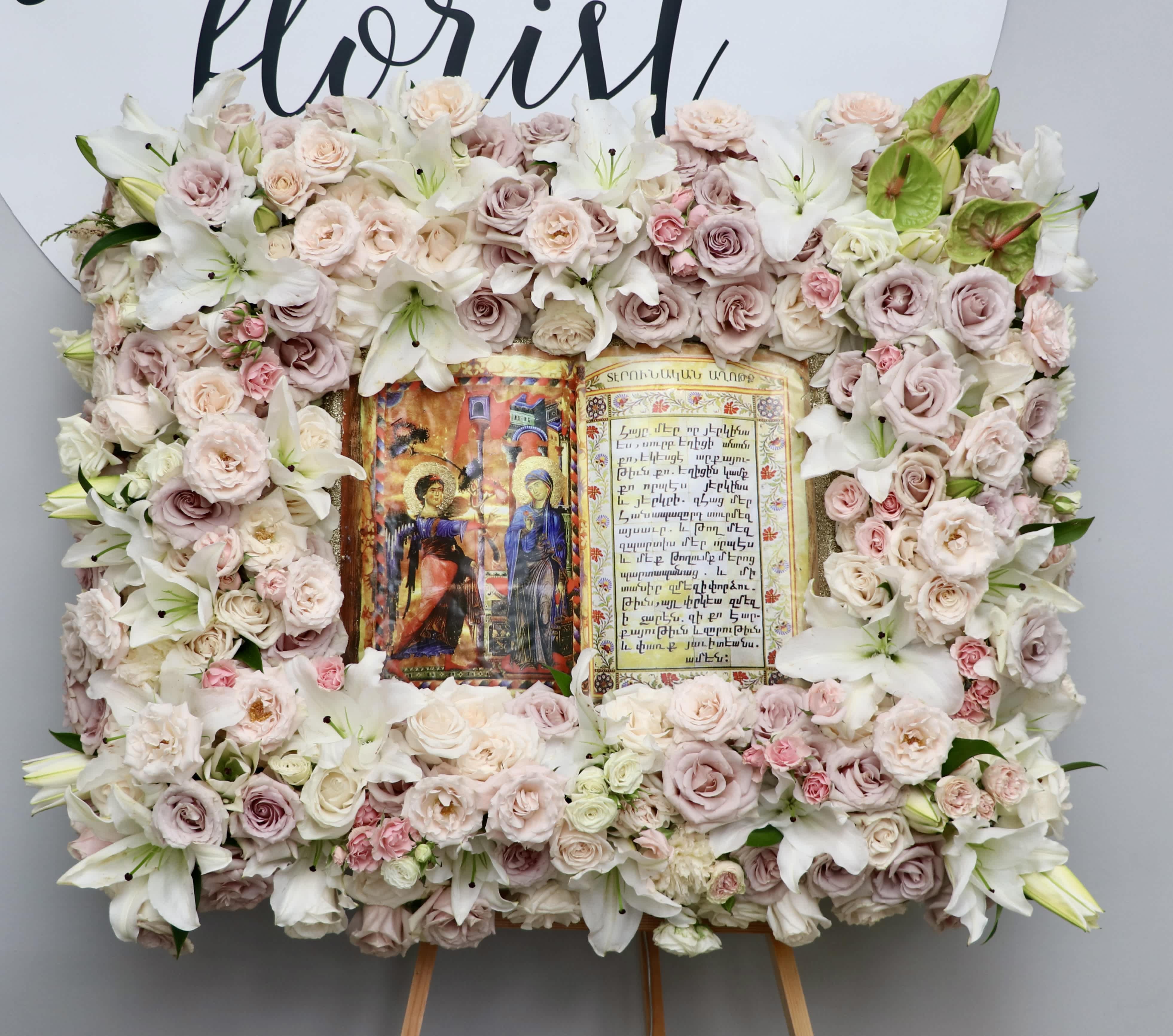 Pink Lily Bible - This framed bible page is made with a variety of pink florals and fragrant lilies.    Standard size is approximately 32&quot;x24&quot;. Deluxe and premium are approximately 36&quot;x28&quot;.    We include easel, printed banner, and delivery (some fees may apply). An additional banner can be added for $15.