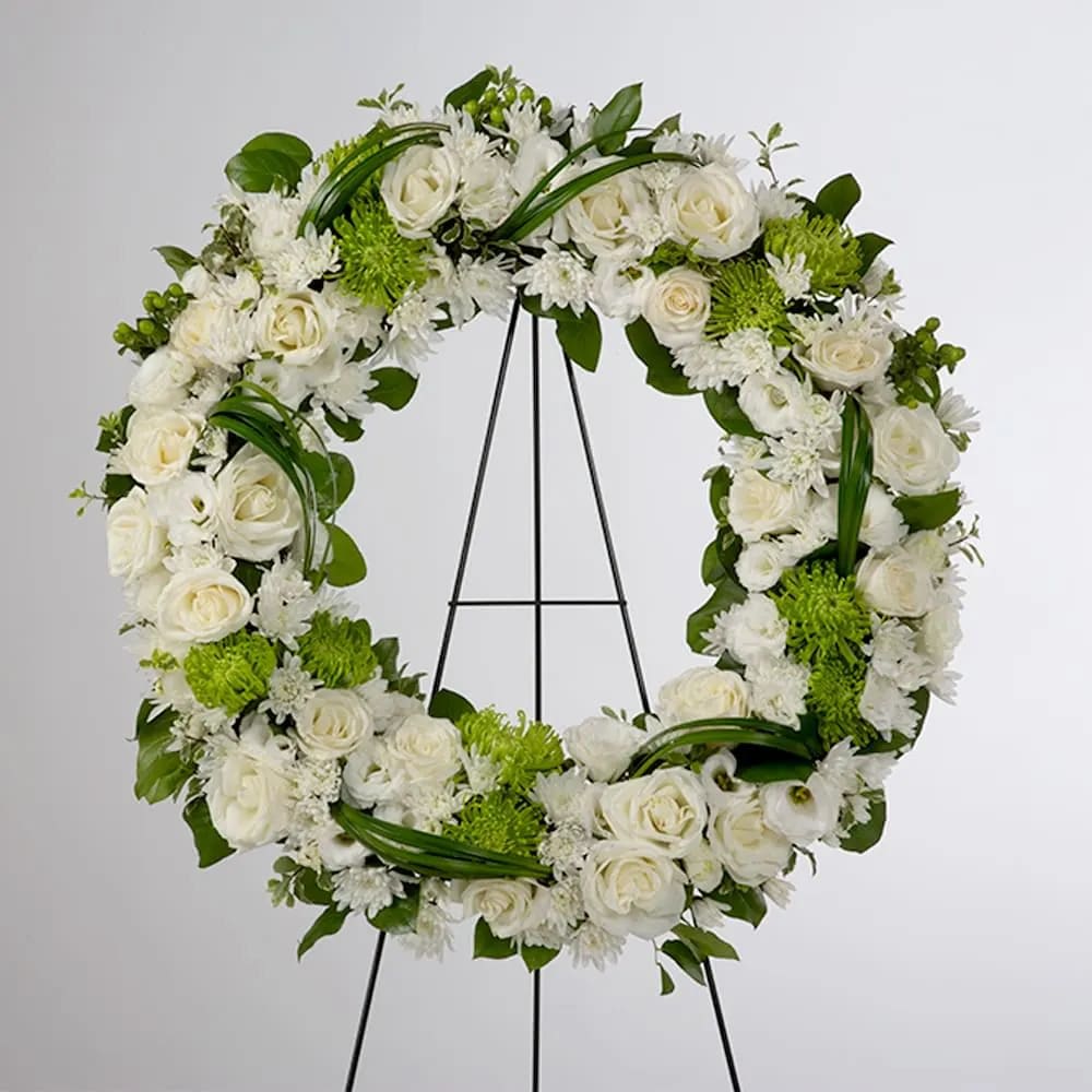 Lasting Serenity Lasting Serenity - A beautiful white and green tribute wreath that calms, this easel arrangement celebrates a full life and a peaceful passing. Add a Sympathy Banner to this arrangement! https://katyflowershop.com/katy-katy-flower-shop/sympathy-banner.html