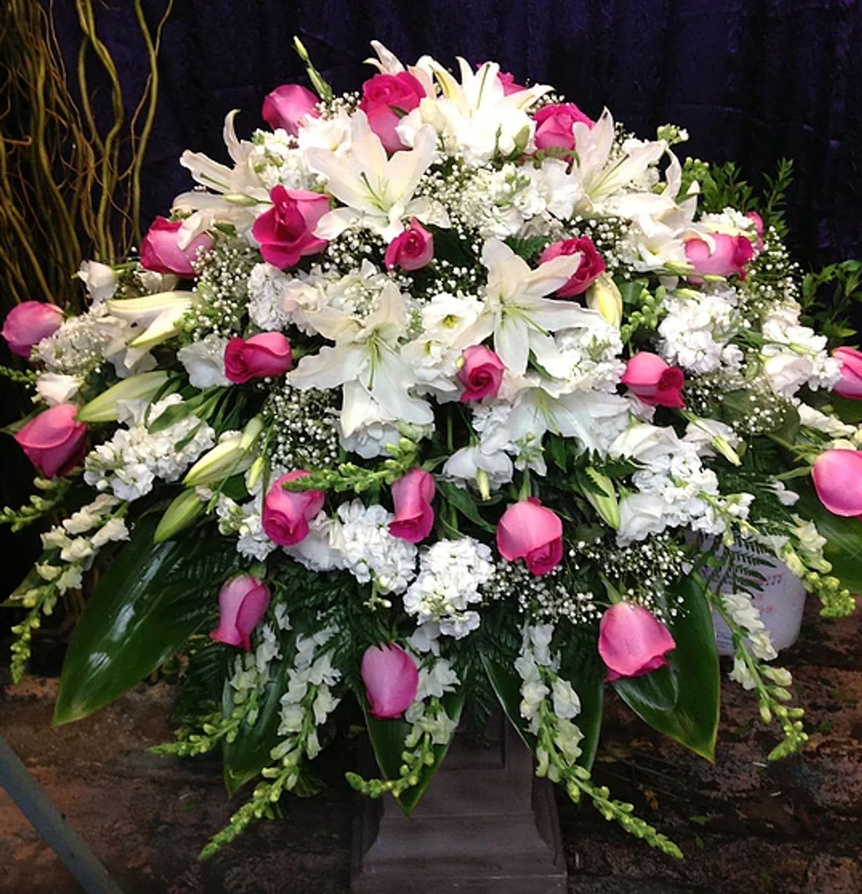 Fucia and White Casket Cover Fucia and White Casket Cover - Beautiful fucia and white casket spray made with seasonal flowers.