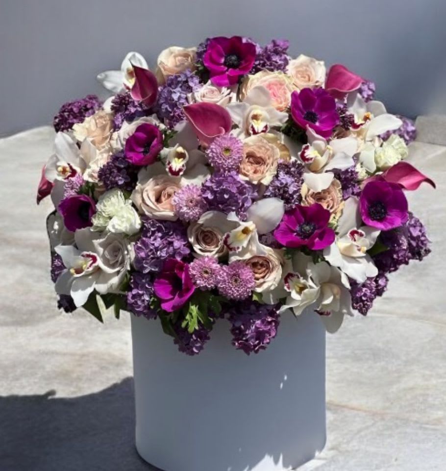 Laura  - Roses, anemone, orchid, lilacs(seasonal only) 