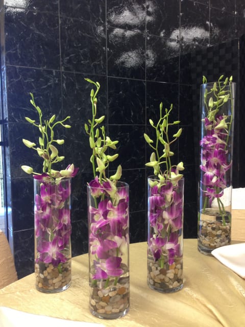 10 Centerpieces V-2 ($39.00 EACH) - Approx. Vase Size: 8&quot;H  Centerpiece Total Size with flowers: 12&quot;H  Flowers: 2 stems of Dendrobium Orchids on each vase  Package of 10 centerpieces  Each additional centerpiece is $39.00 (please call us to add more)