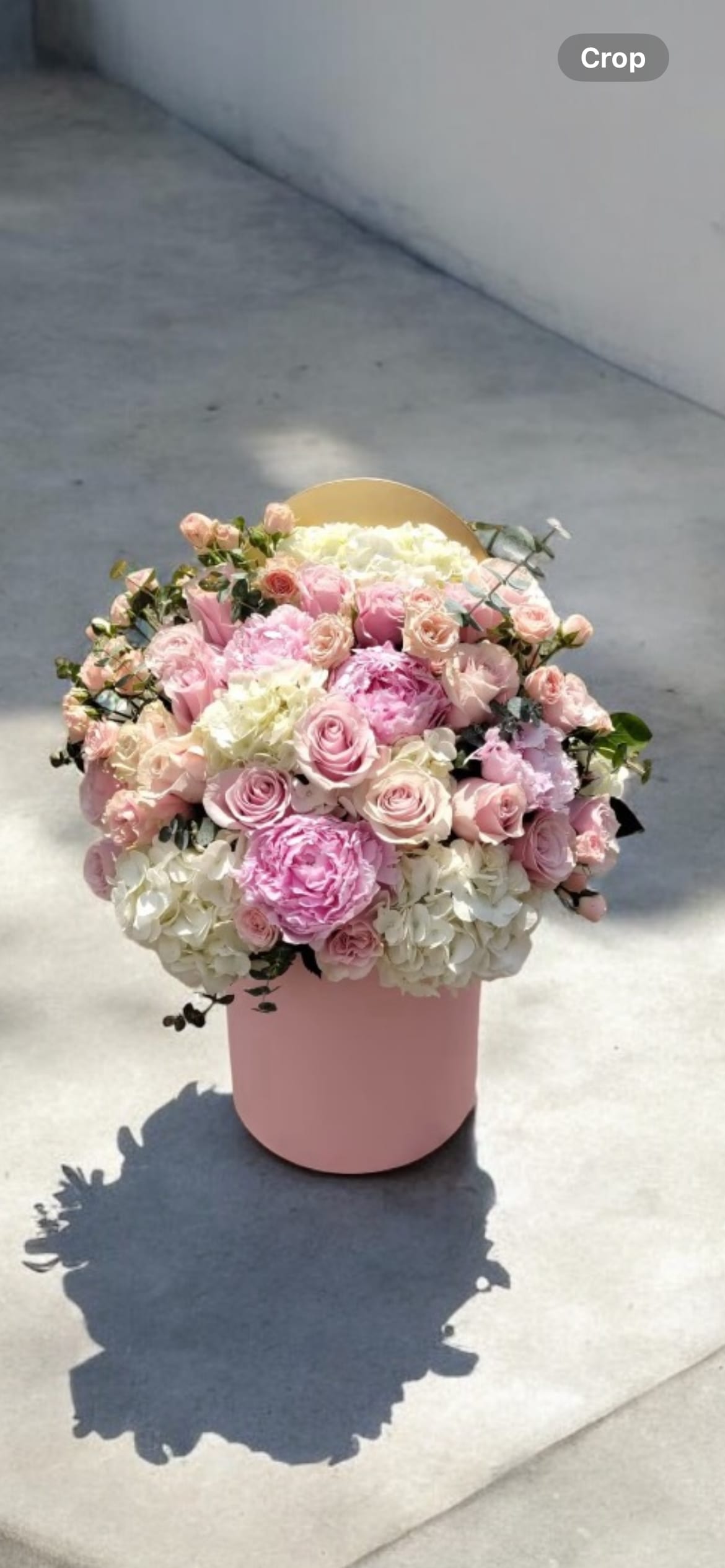 Lovely Pink - Pink peonies (seasonal) pink roses, pink spray roses, white hydrangea, eucalyptus, in a pink box  