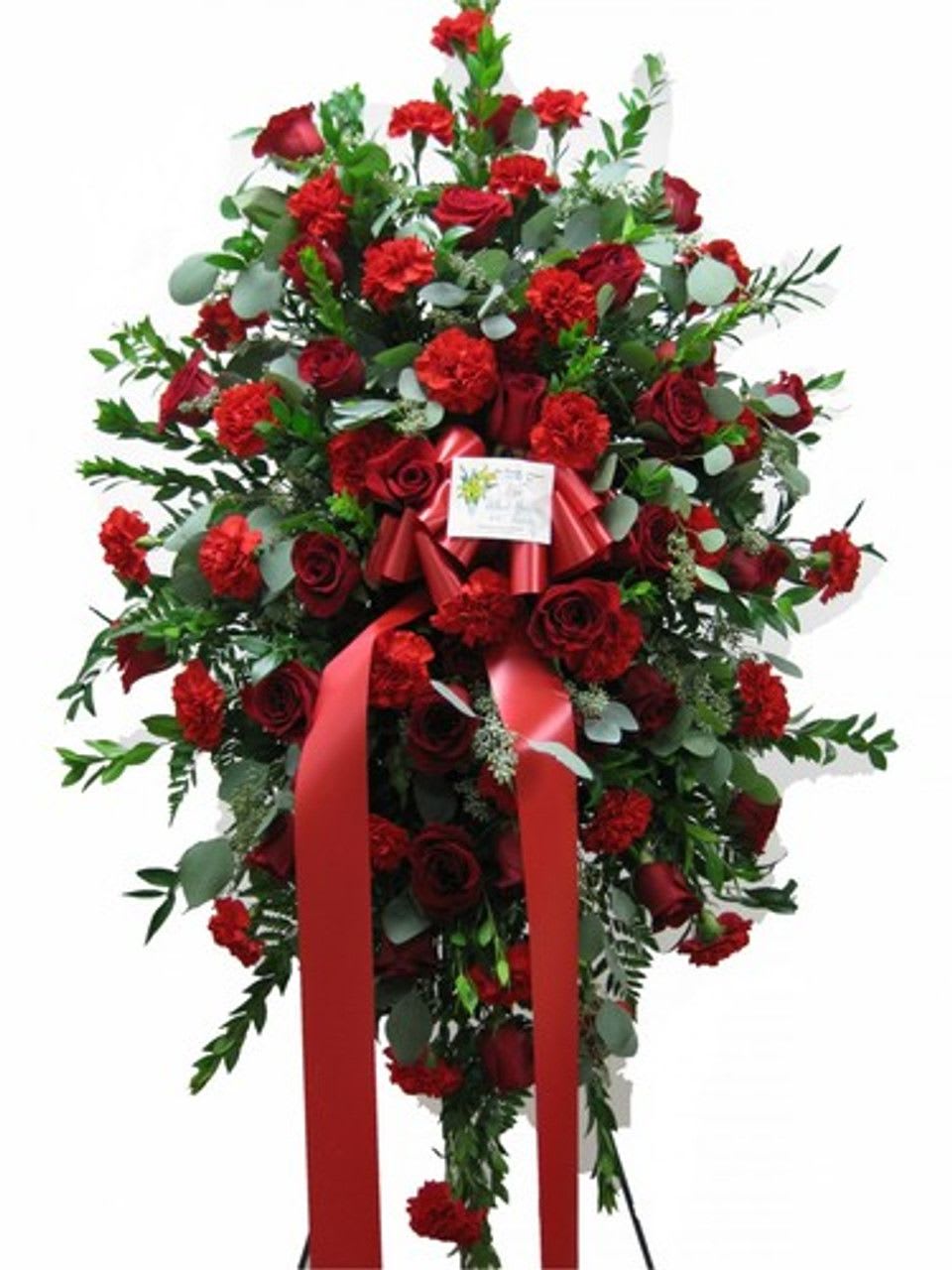 All Red Standing Spray - All white standing spray made with Roses, Carnations, Eucalyptus and fillers.