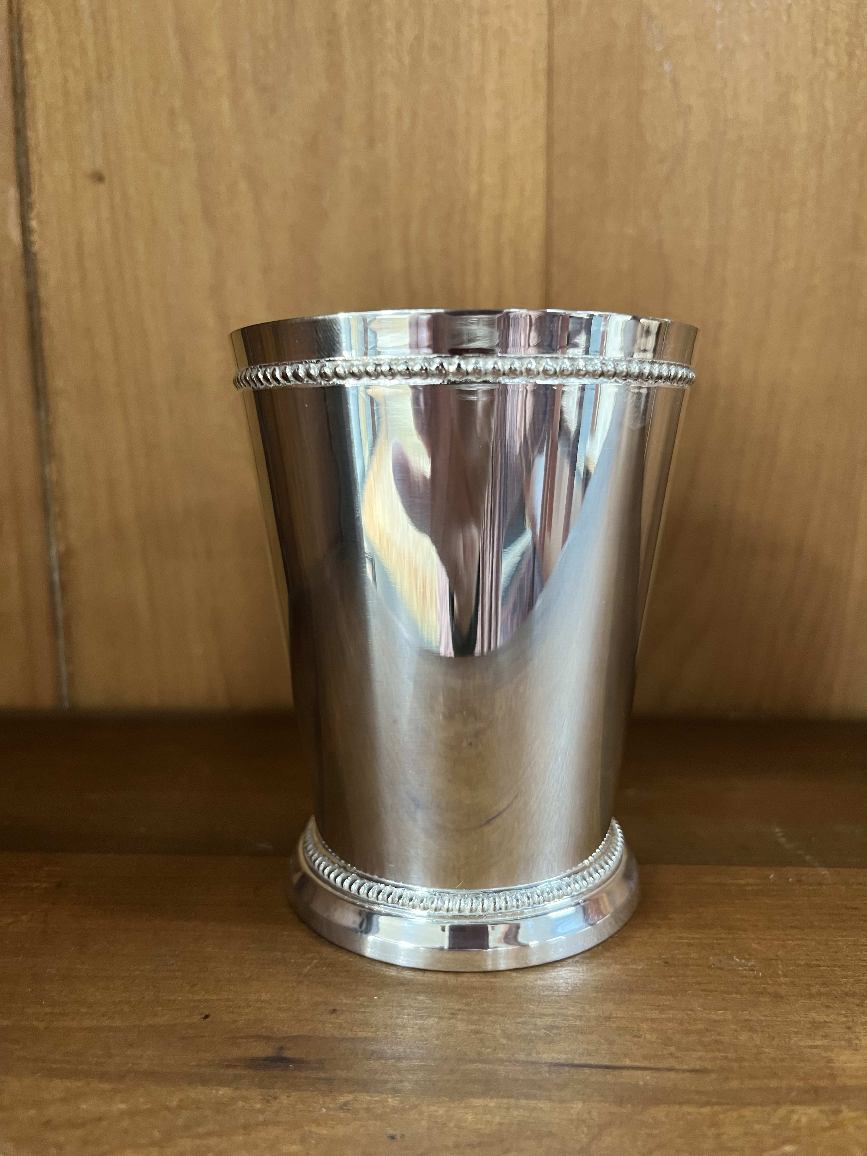 Silver Mint Julep Cup (4.25") Silver Mint Julep Cup (4.25") - Use on your bar and serve up the perfect Mint Julep or have out talented design team fill with roses for your bedside or anywhere you want a little splash of color. Four inches tall with 10 oz. capacity.